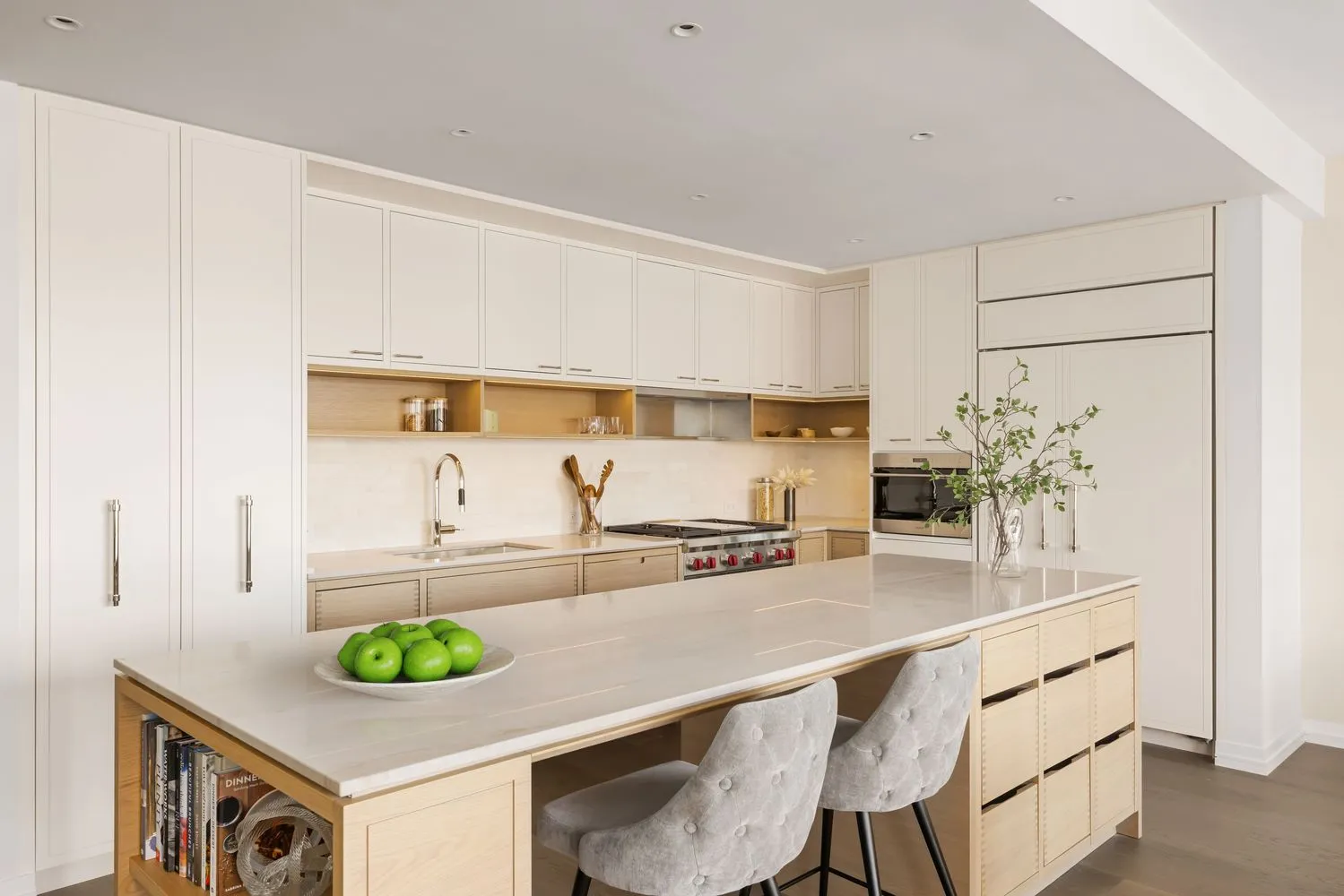a kitchen with a sink a stove and cabinets