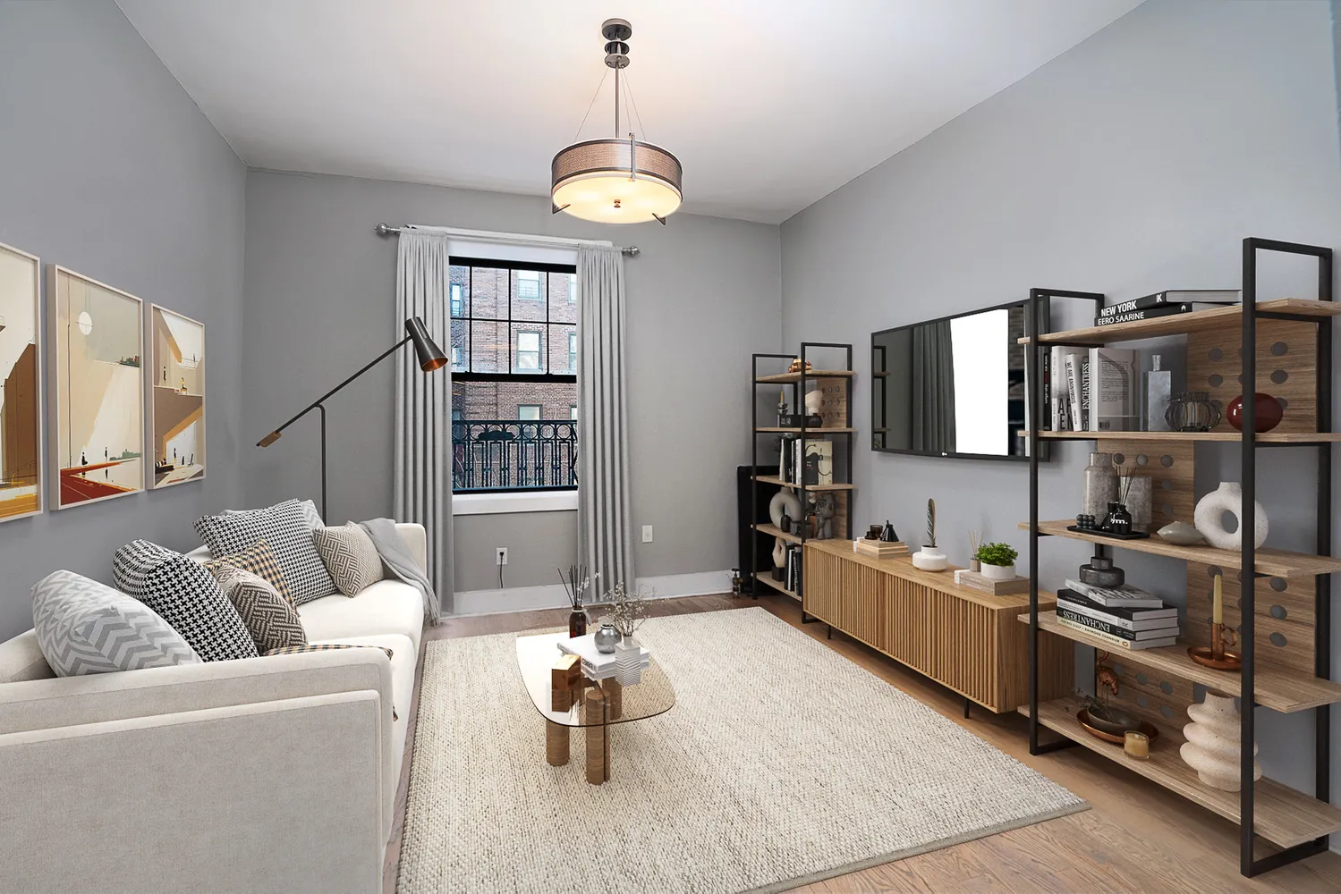 a living room with furniture and a flat screen tv