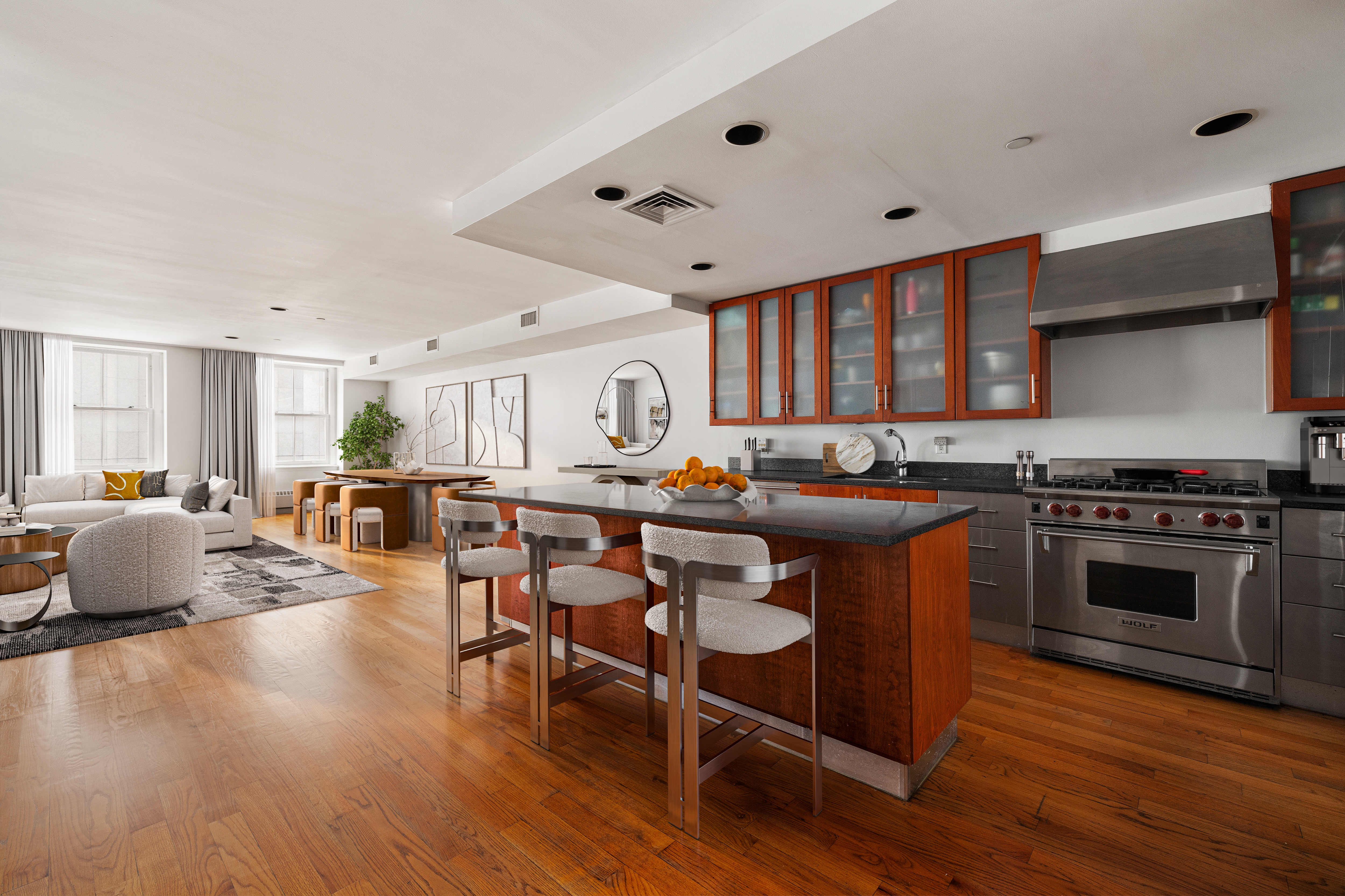 73 Worth Street, Unit 5E Manhattan, NY 10013 - Photo 2 of 10 a open kitchen with stainless steel appliances granite countertop a stove a sink dishwasher a dining table and chairs with wooden floor