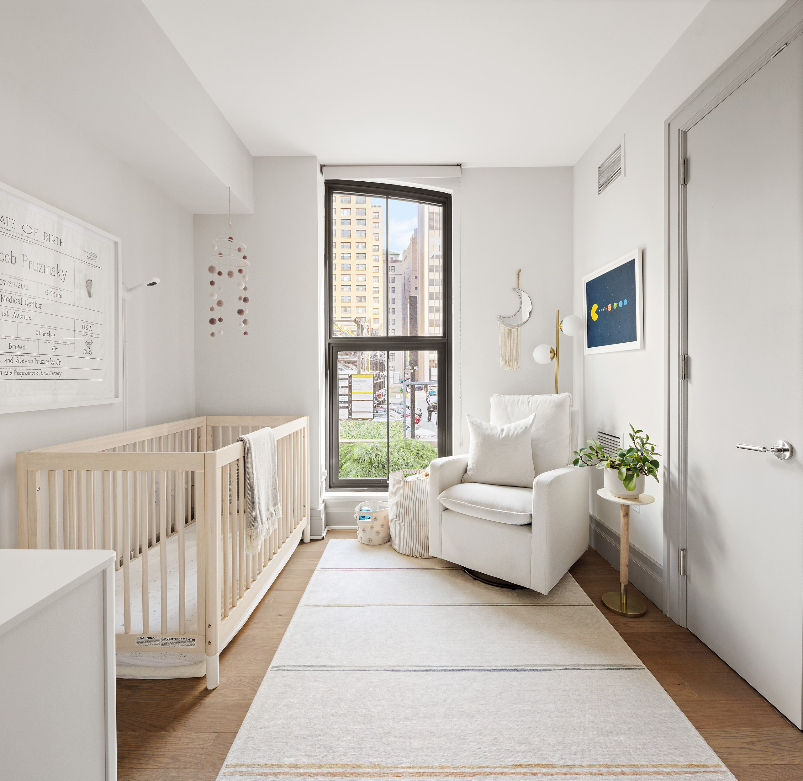 76 Schermerhorn Street, Unit 2C Brooklyn, NY 11201 - Photo 7 of 16 a living room with furniture and wooden floor