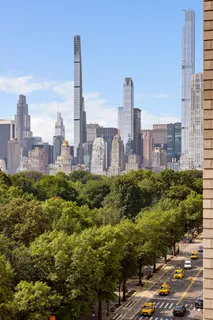 a view of a city with tall buildings