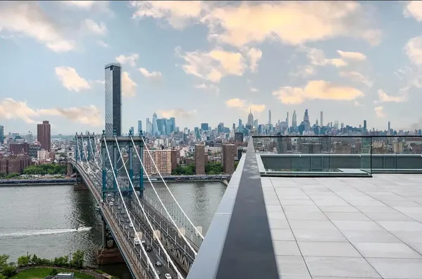 a view of a balcony with city view