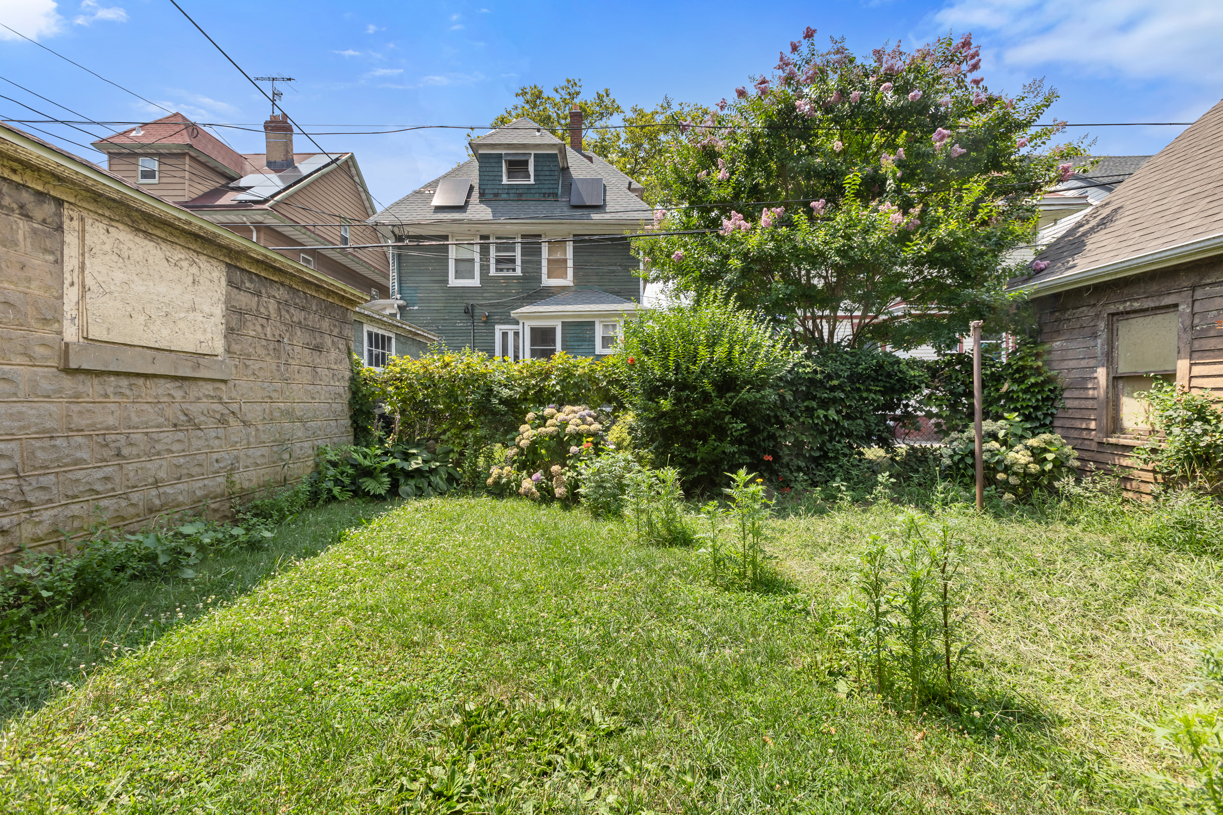686 Rugby Road Brooklyn, NY 11230 - Photo 12 of 18 a view of a big yard in front of a house