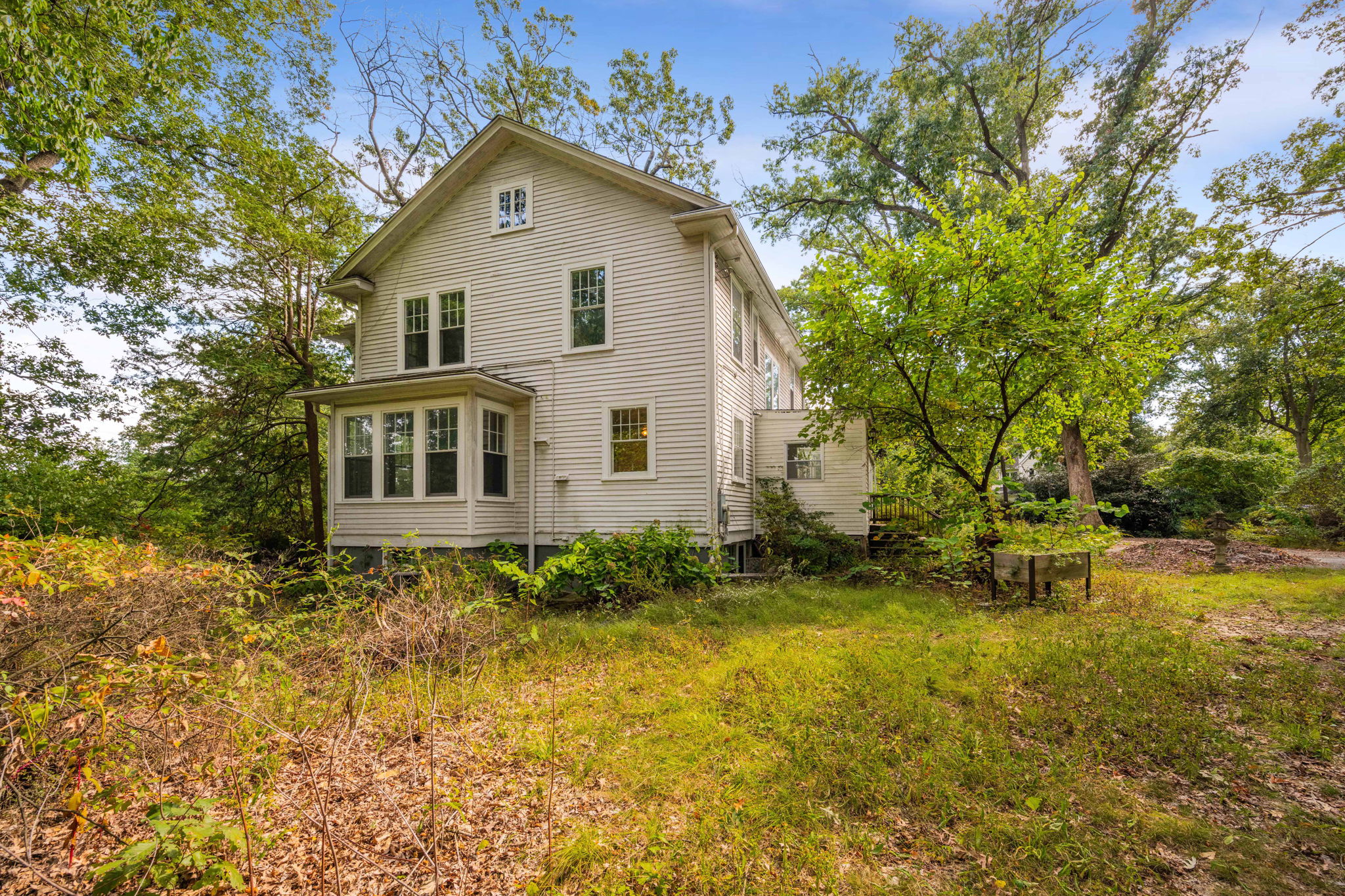 3104 Russell Road Alexandria, VA 22305 - Photo 31 of 62 a view of a house with a yard