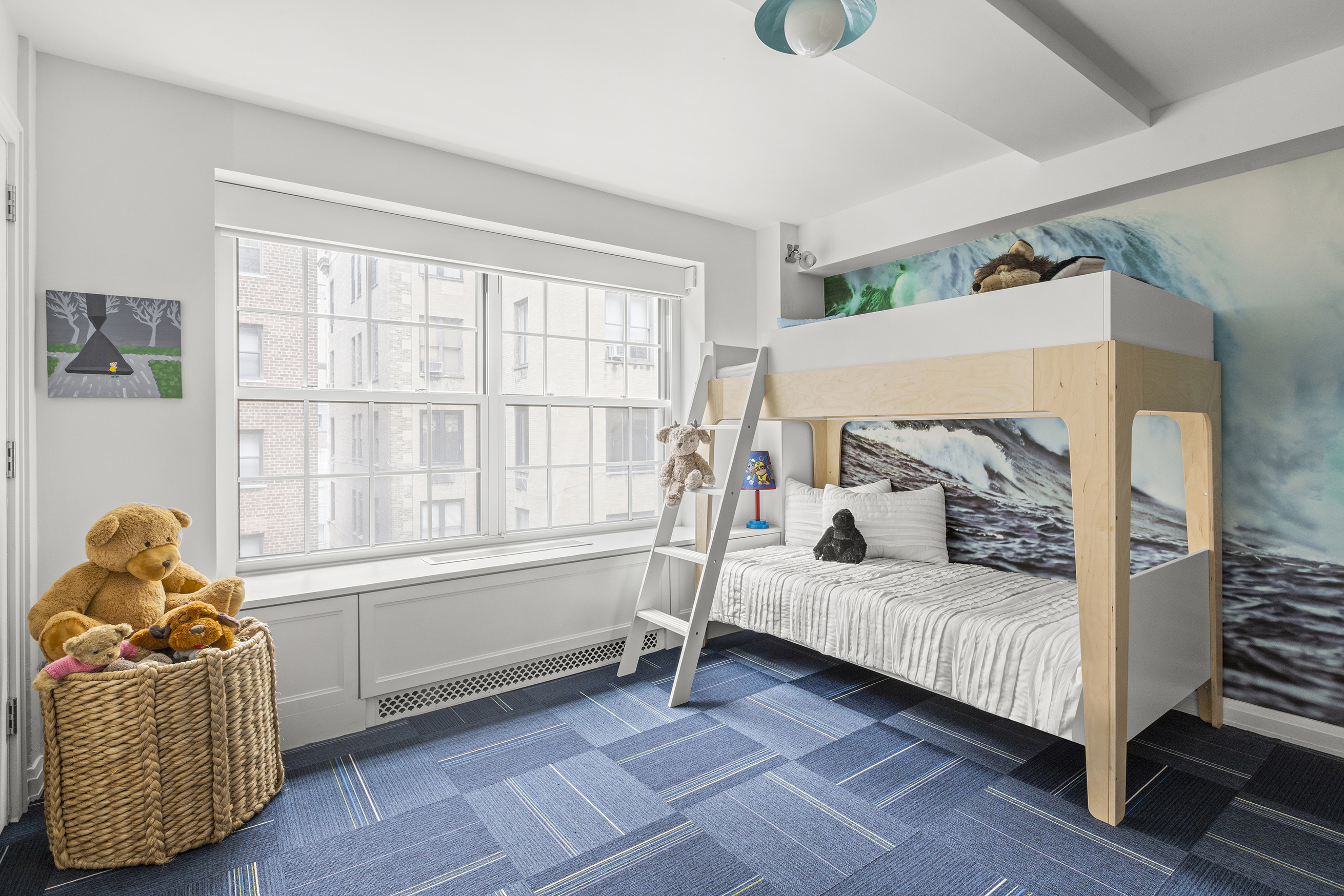 12 East 88th Street, Unit 8A Manhattan, NY 10128 - Photo 10 of 19 a bedroom with furniture and a window