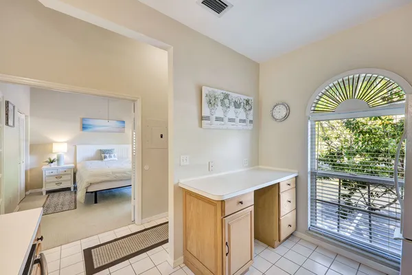 a view of a kitchen cabinets and wooden floor