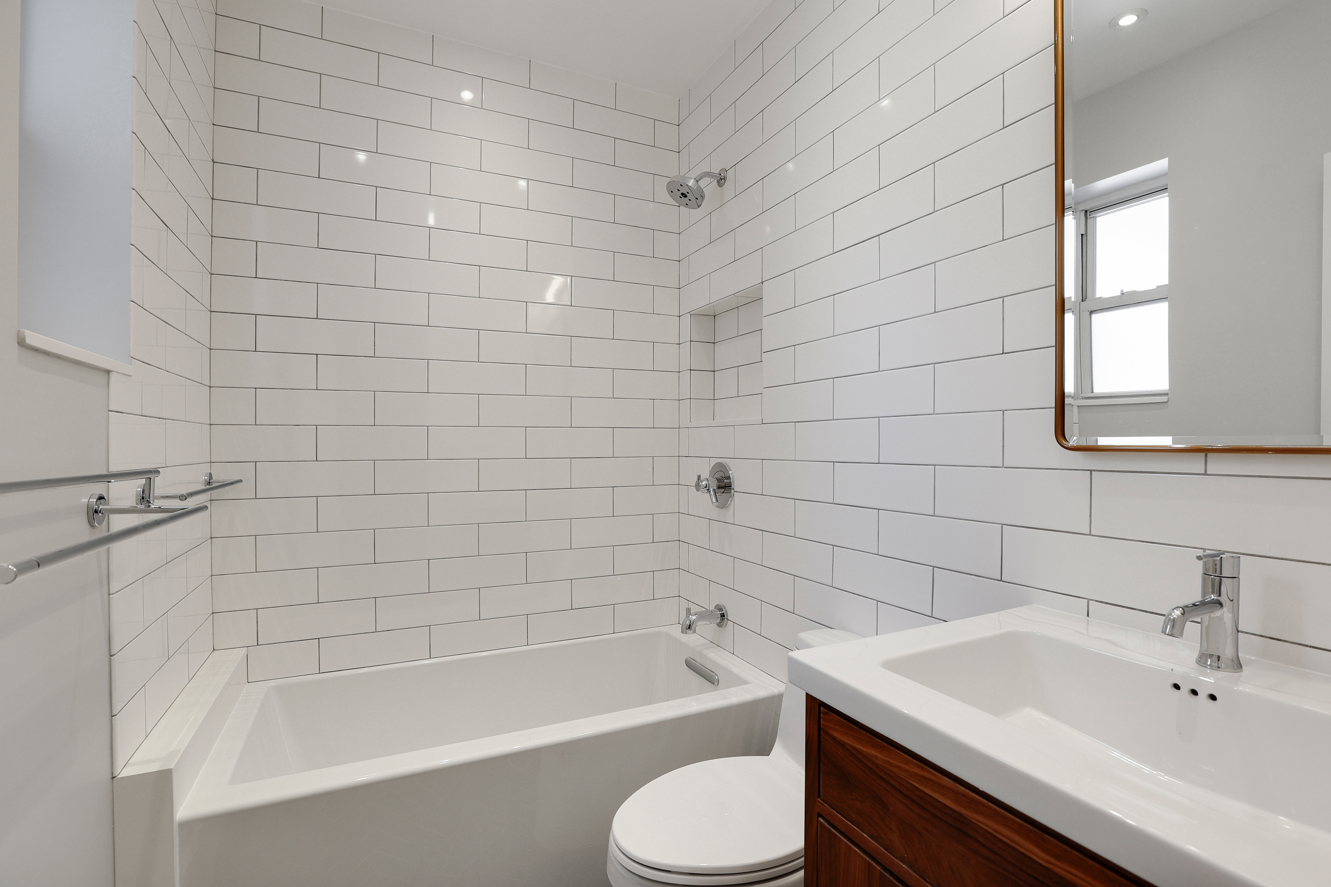 133 East 30th Street, Unit PH5B Manhattan, NY 10016 - Photo 23 of 24 a bathroom with a sink a toilet and bathtub