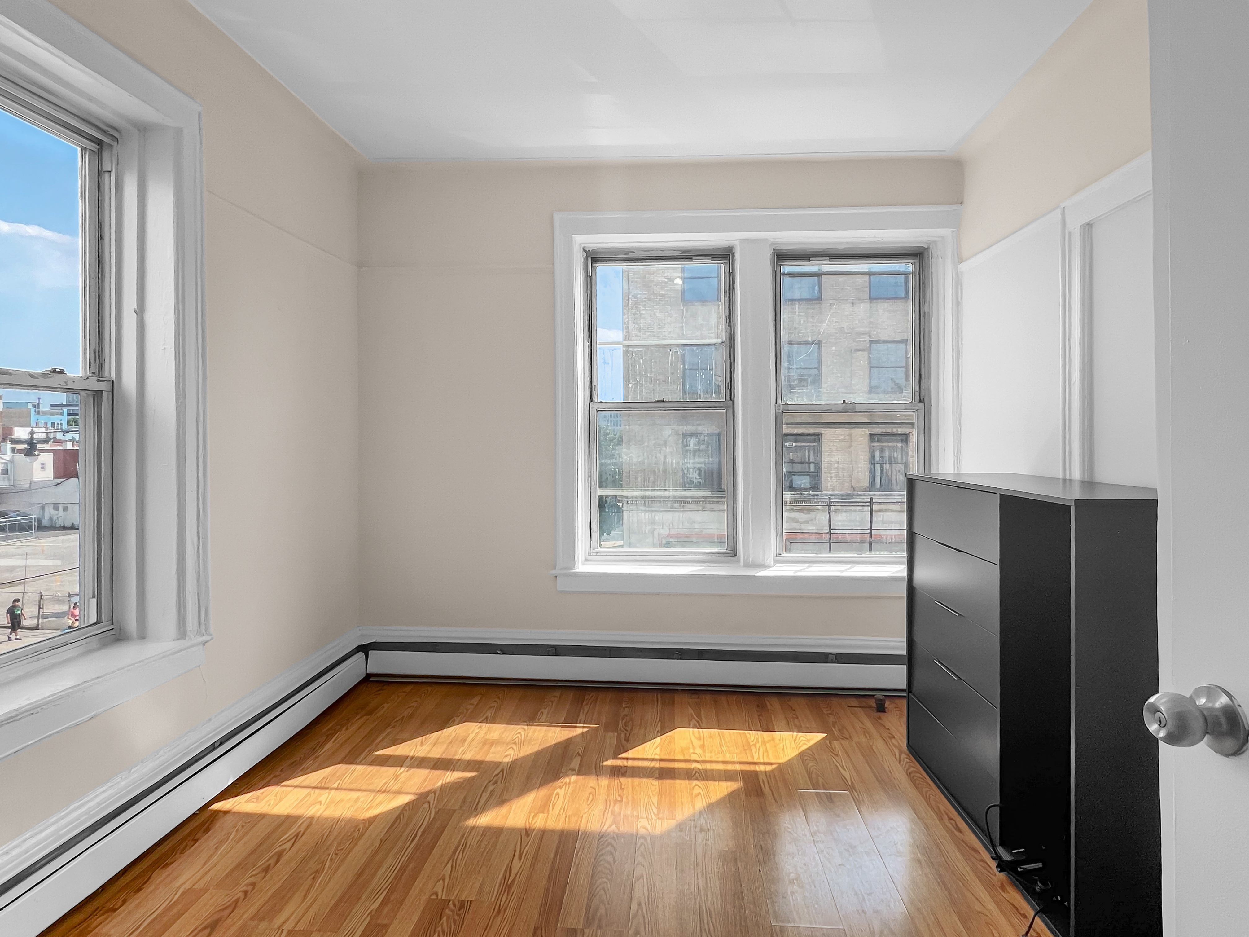 35-19 Broadway, Unit 3 Queens, NY 11106 - Photo 2 of 11 a view of a kitchen with a tub and window