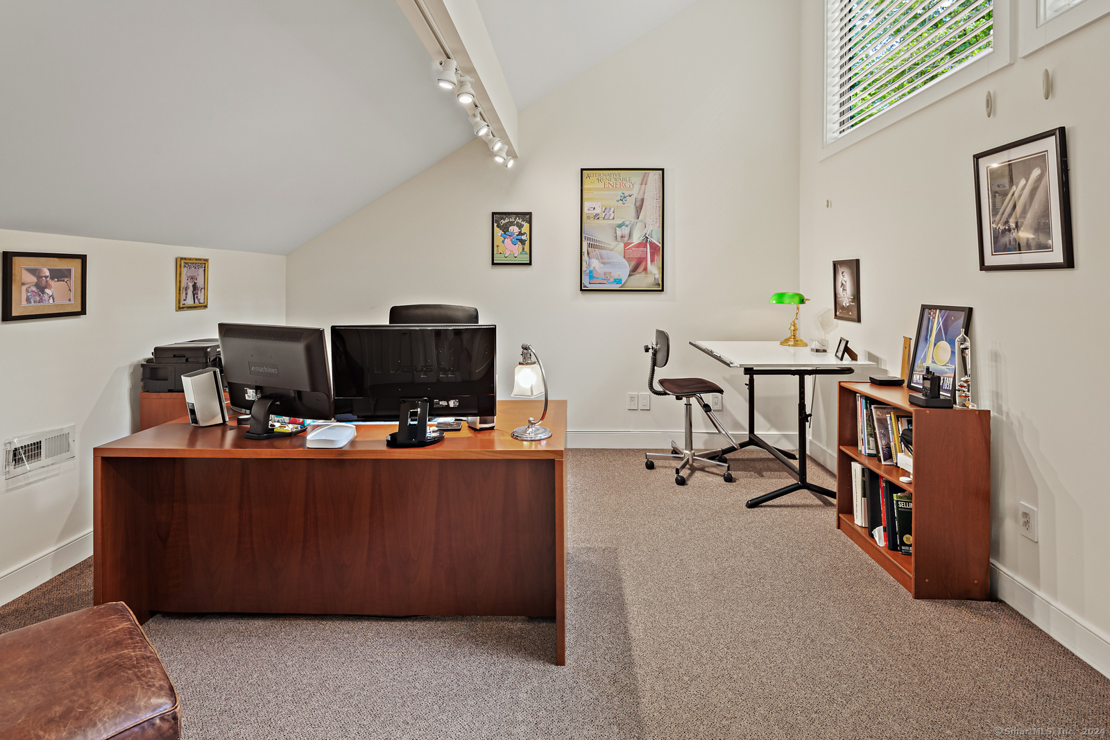 13 Bittersweet Road Weston, CT 06883 - Photo 14 of 35 a living room with furniture and a flat screen tv