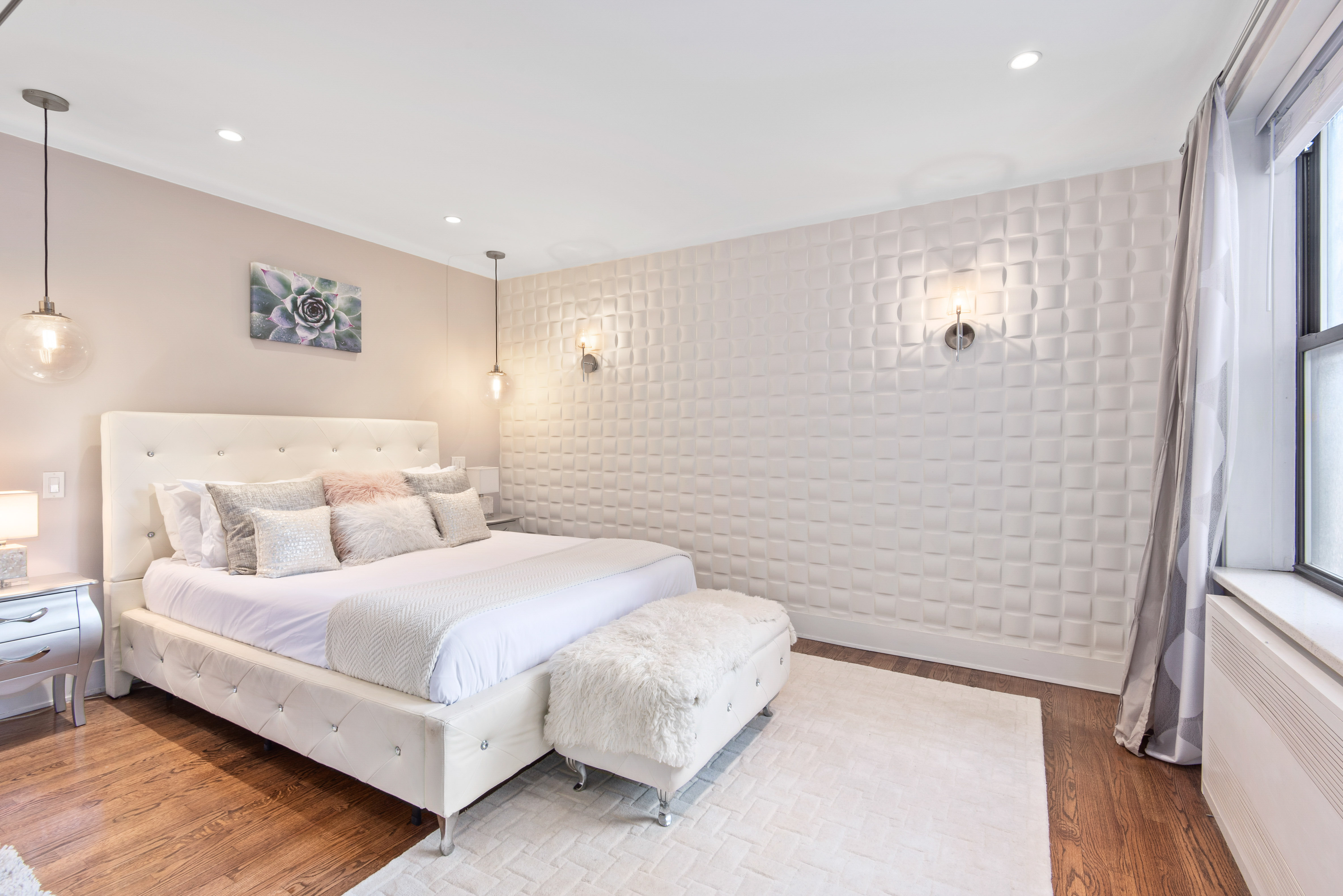 61 Oliver Street, Unit 4P Brooklyn, NY 11209 - Photo 6 of 11 a bedroom with a bed and a rug