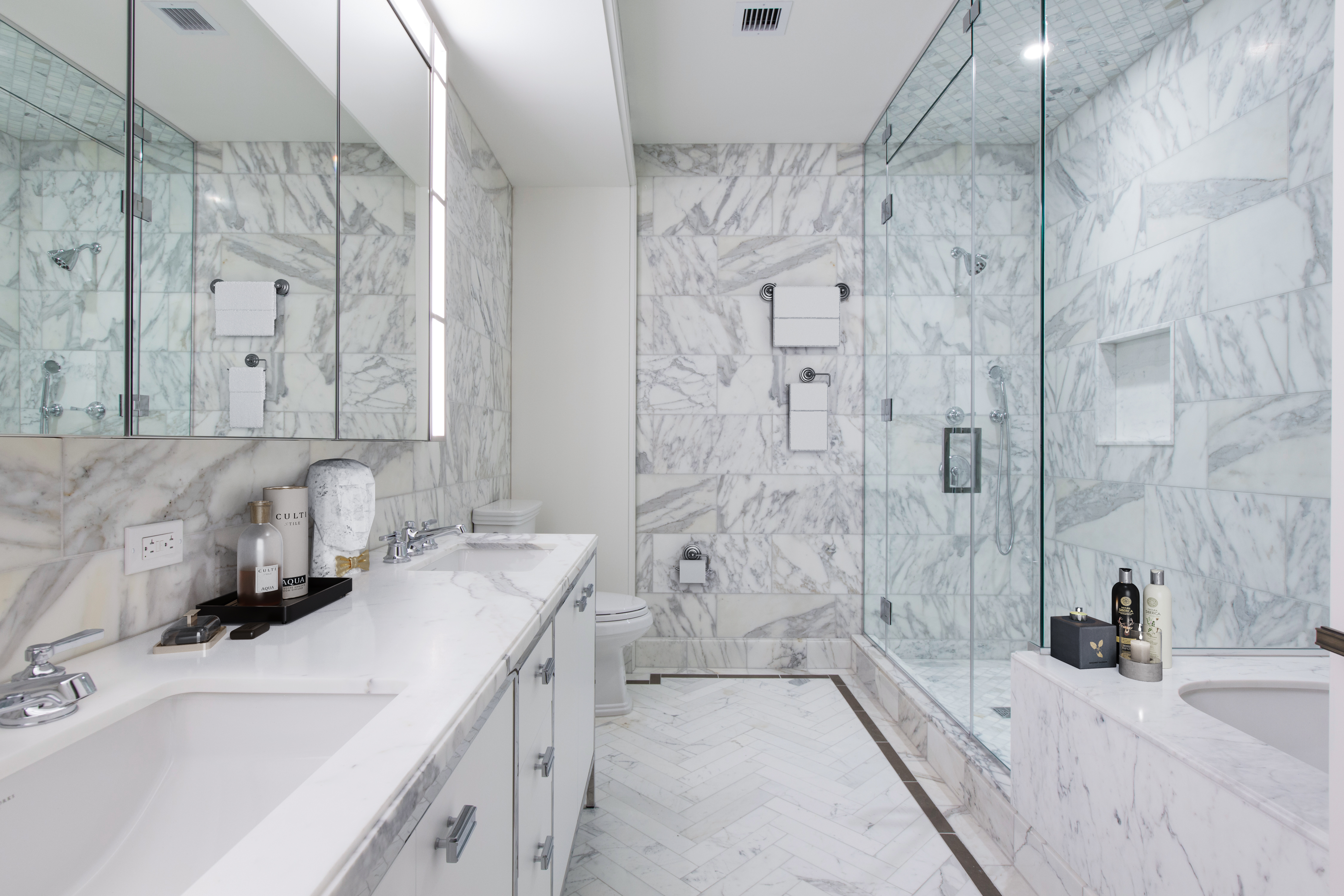 100 Barclay Street, Unit 17H Manhattan, NY 10007 - Photo 7 of 11 a bathroom with a tub sink and mirror