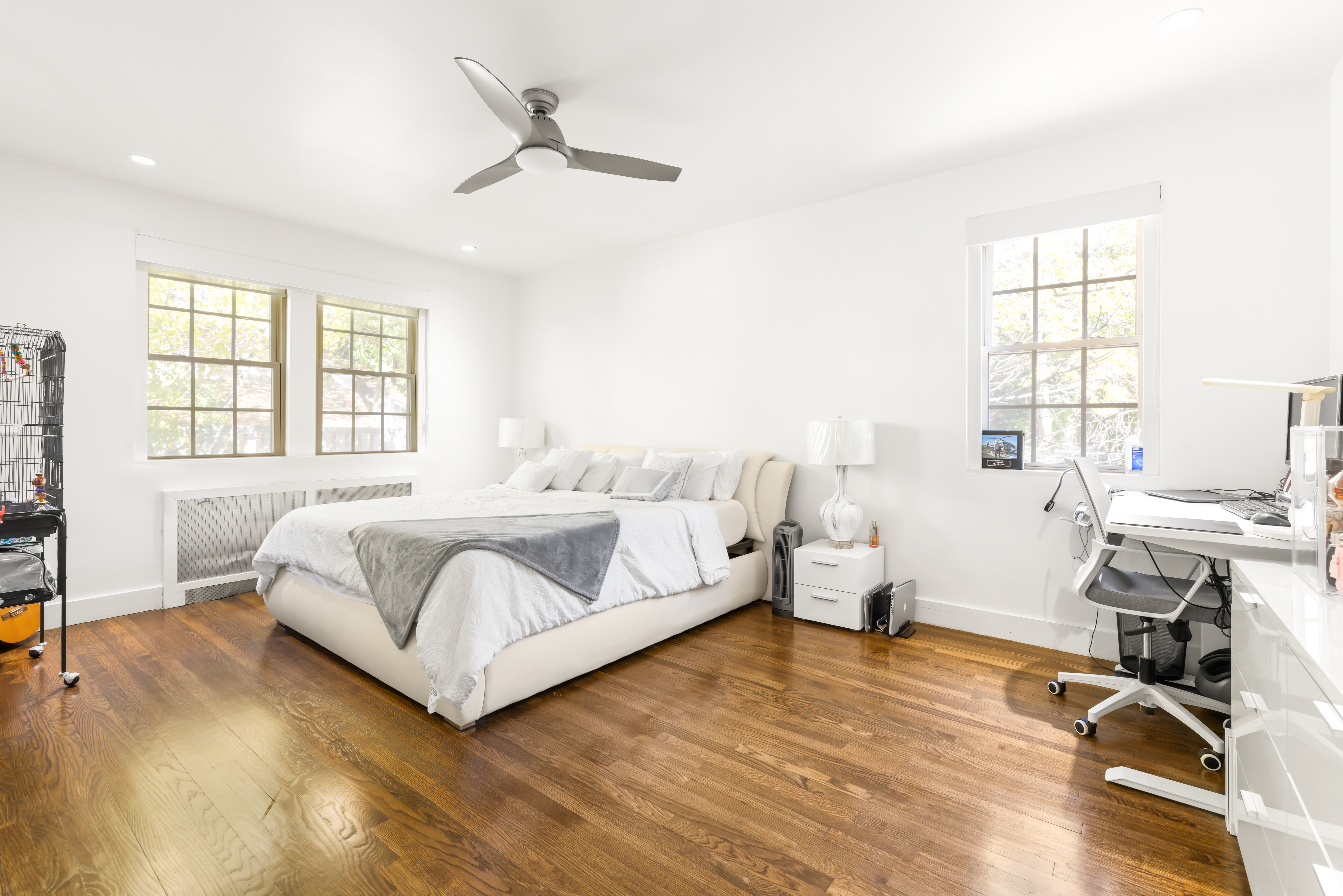 1490 Beacon Street, Unit 4 Brookline, MA 02446 - Photo 16 of 20 a spacious bedroom with a bed and a large window