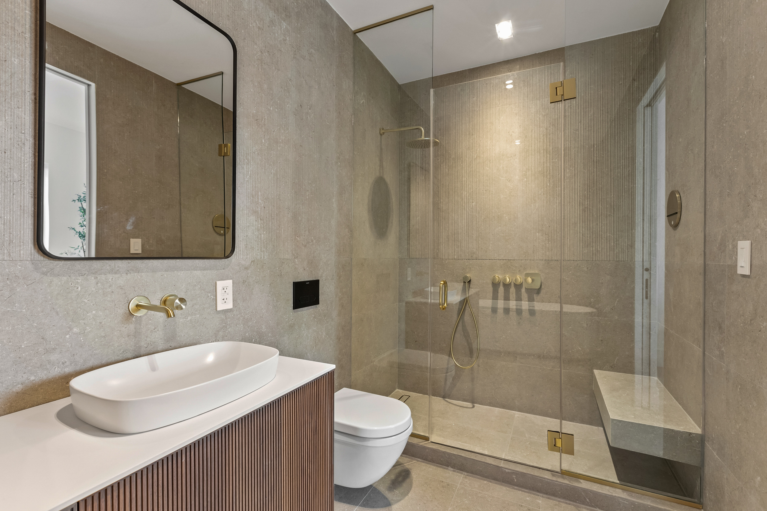 28 Herbert Street, Unit 4C Brooklyn, NY 11222 - Photo 4 of 13 a bathroom with a sink a toilet and shower