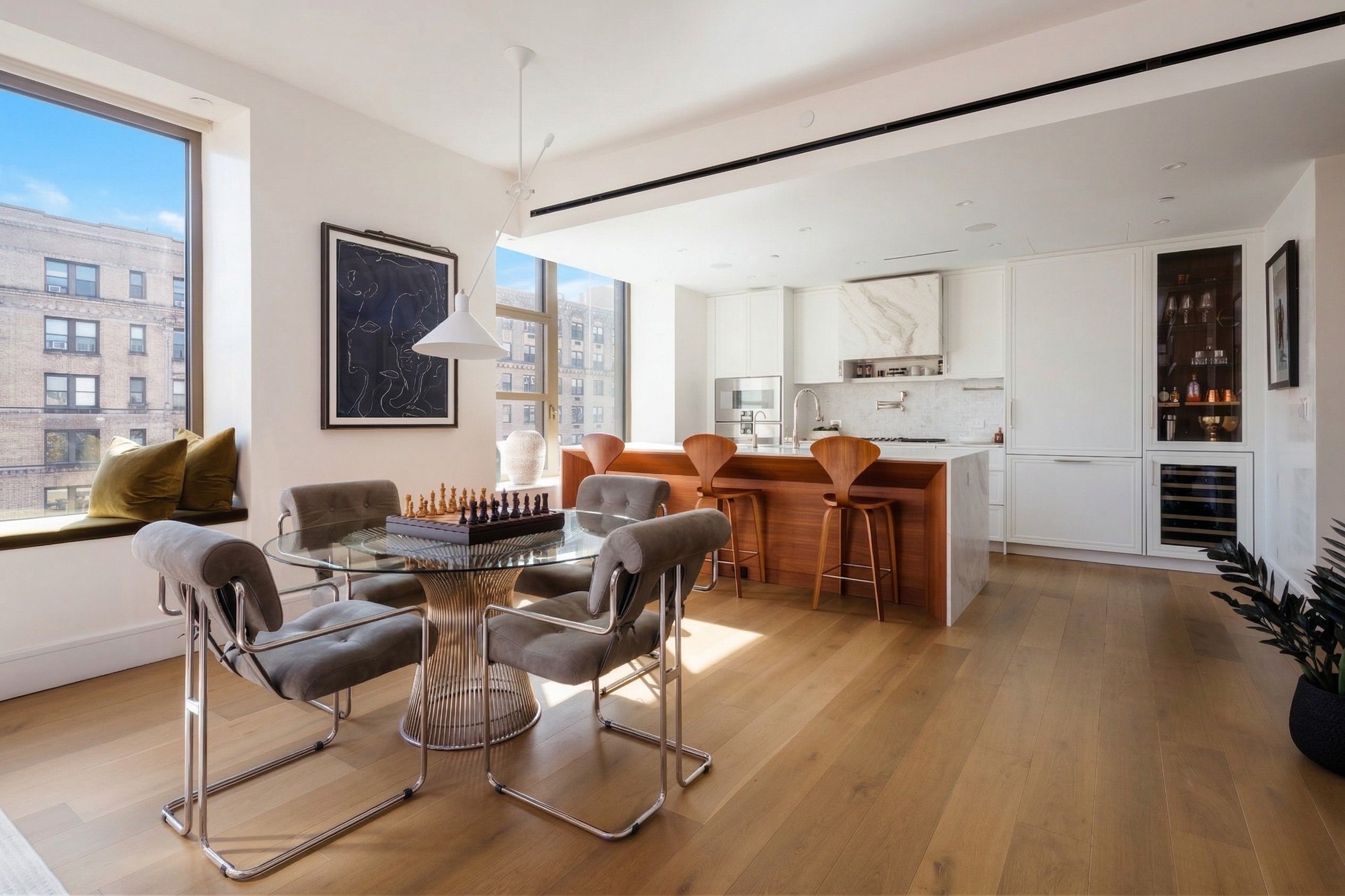 251 West 91st Street, Unit 11B Manhattan, NY 10024 - Photo 7 of 28 a living room with furniture a flat screen tv and a window