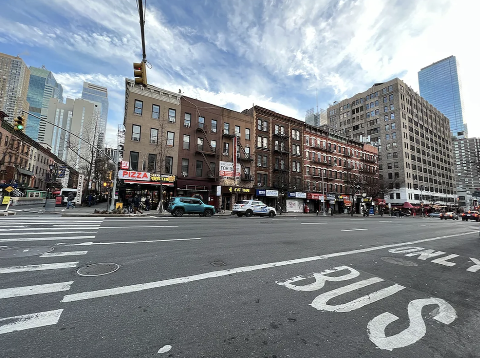 446 West 46th Street, Unit 12 Manhattan, NY 10036 - Photo 17 of 18 a view of a city street both side of a building