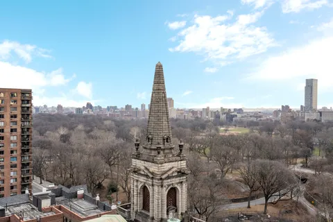 a view of a city with tall buildings