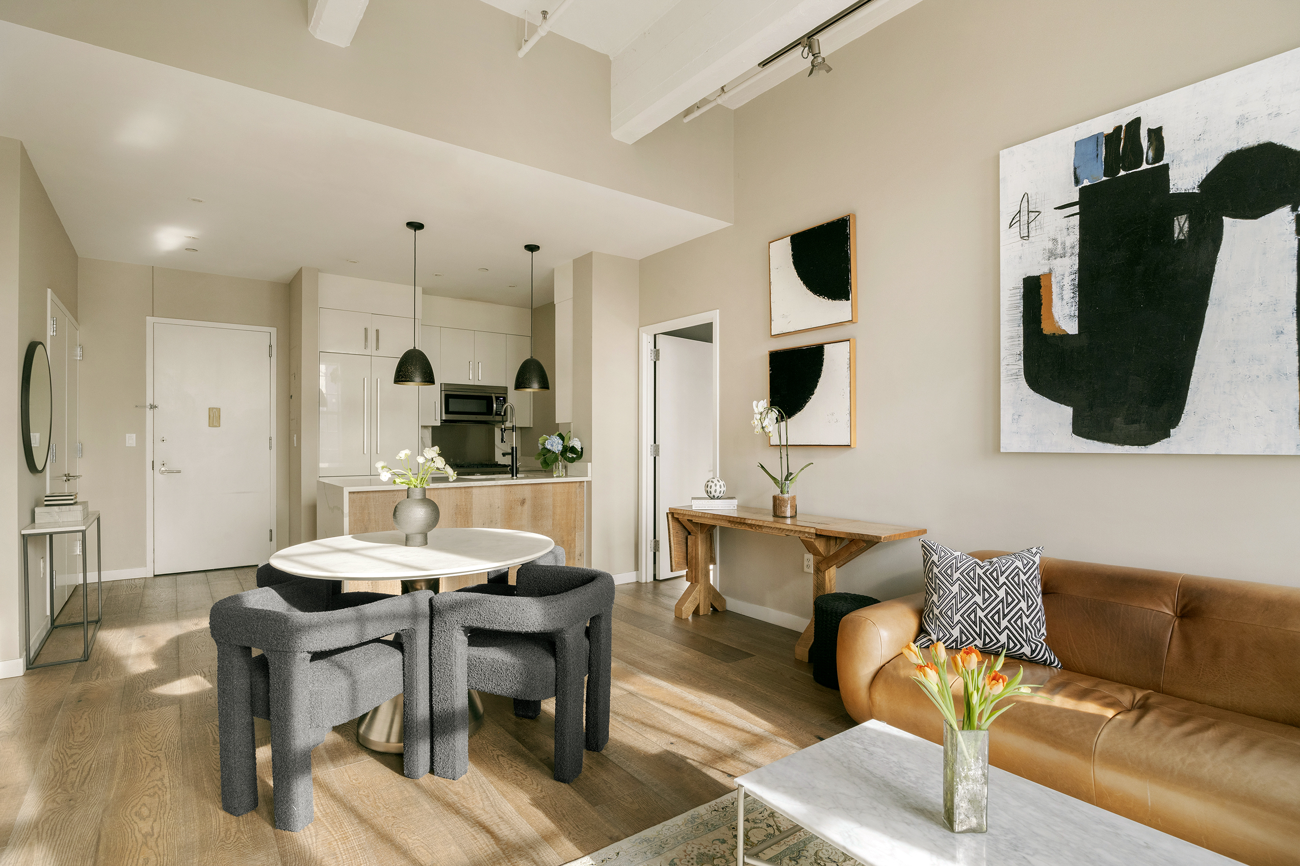 184 Kent Avenue, Unit B305 Brooklyn, NY 11249 - Photo 2 of 15 a view of a dining room with furniture