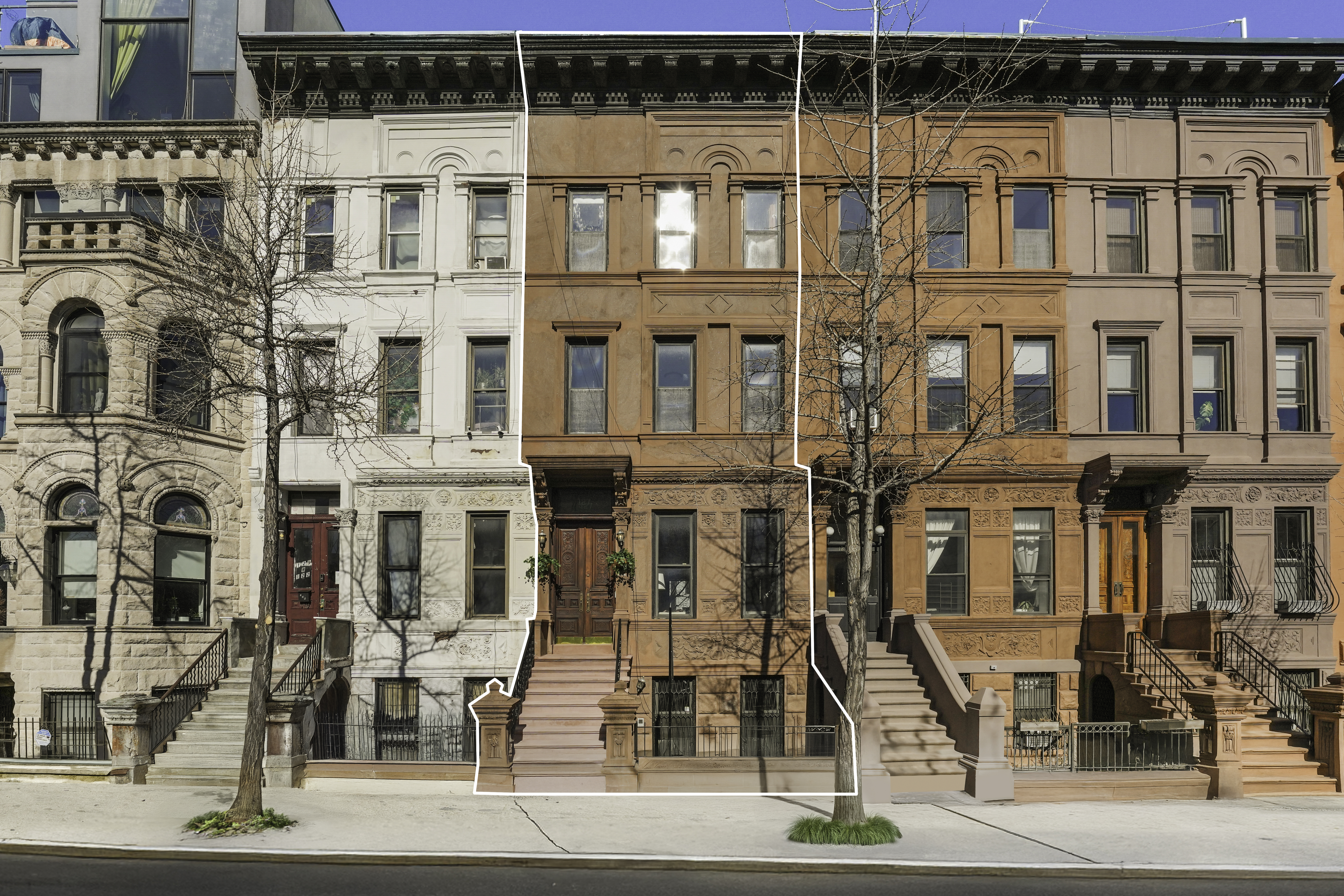 127 West 122nd Street Manhattan, NY 10027 - Photo 16 of 17 a front view of a building with glass windows