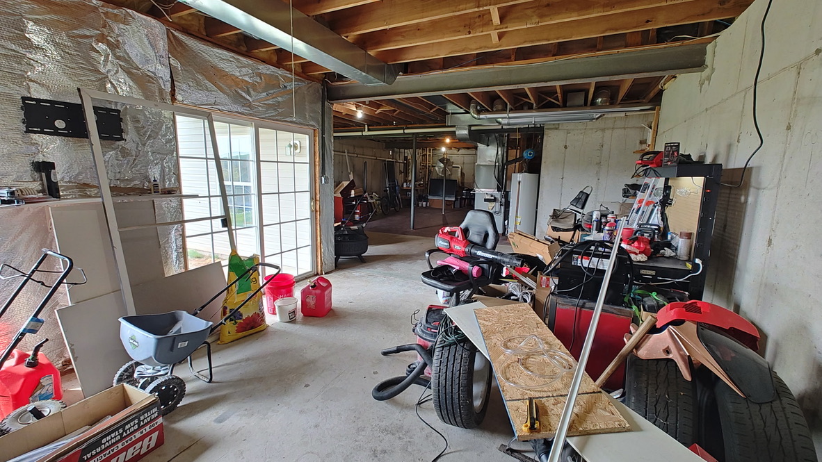 127 Hartman Road Pottstown, PA 19465 - Photo 31 of 42 a view of a storage room with gym equipment