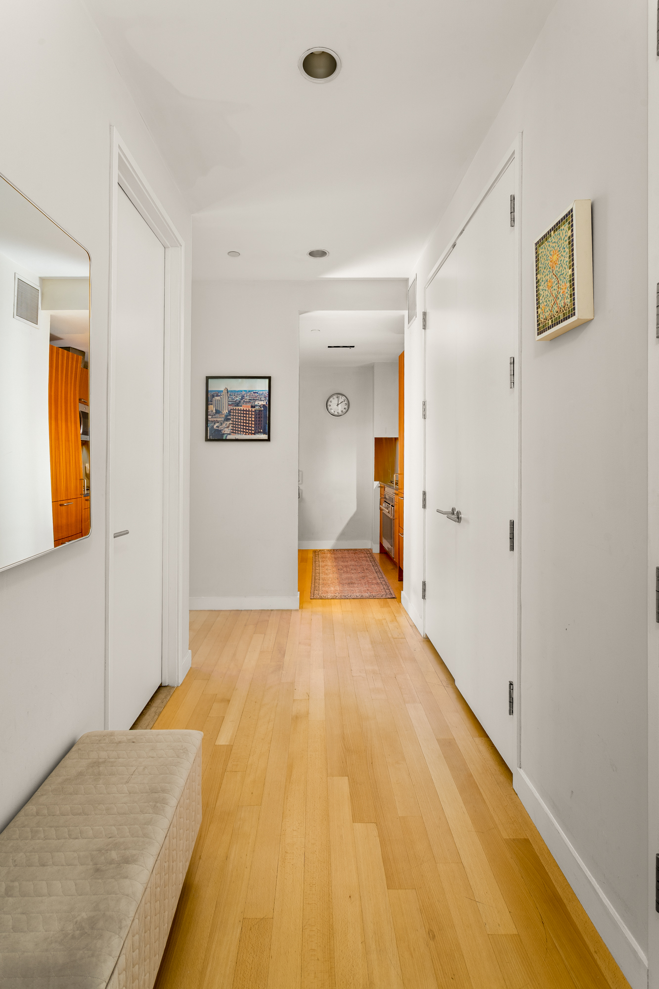 450 East 83rd Street, Unit 5K Manhattan, NY 10028 - Photo 8 of 16 a view of a big room with wooden floor and closet