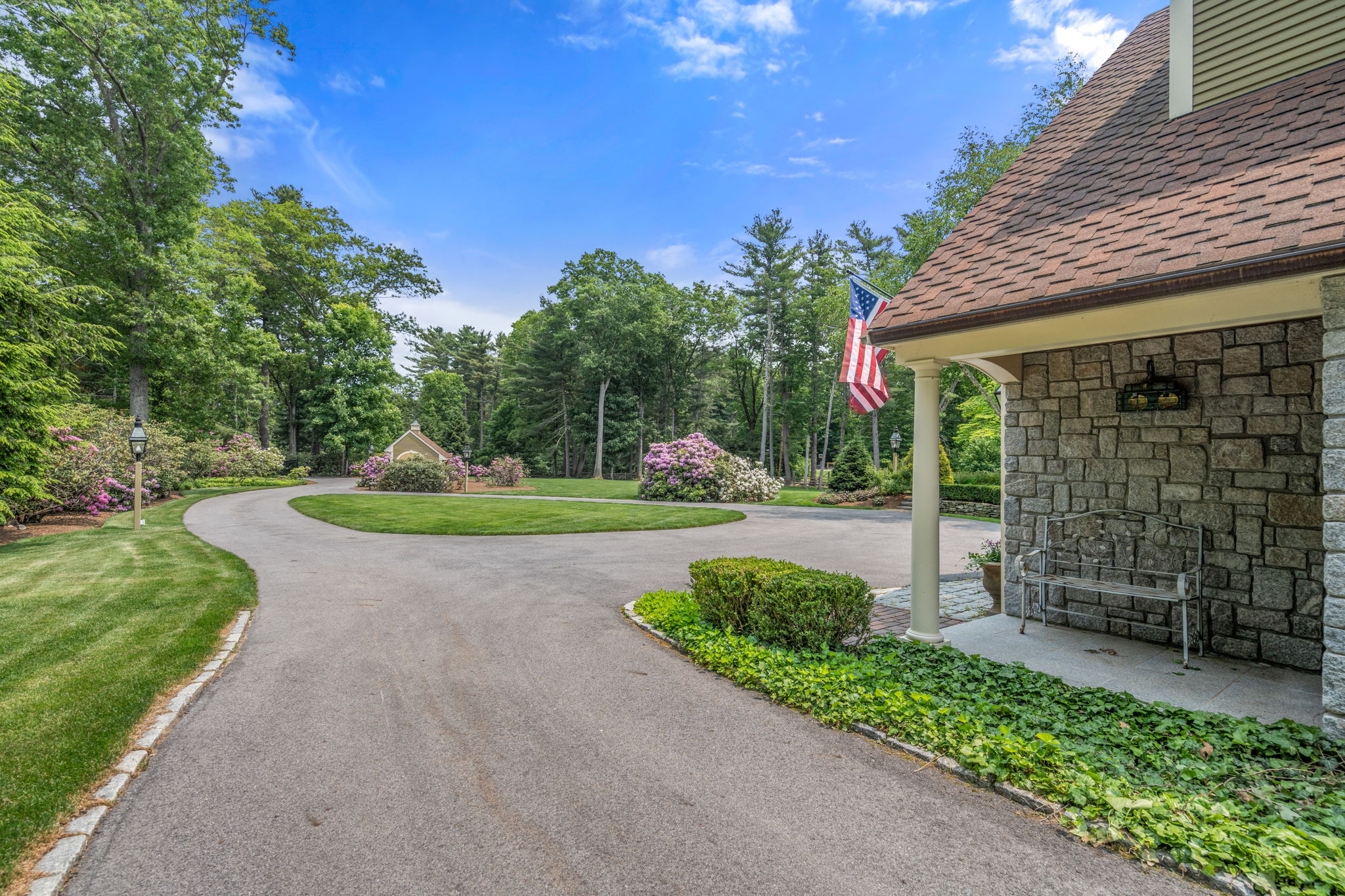 100 Farm Road Sherborn, MA 01770 - Photo 16 of 17 a view of a chair and table in backyard of the house