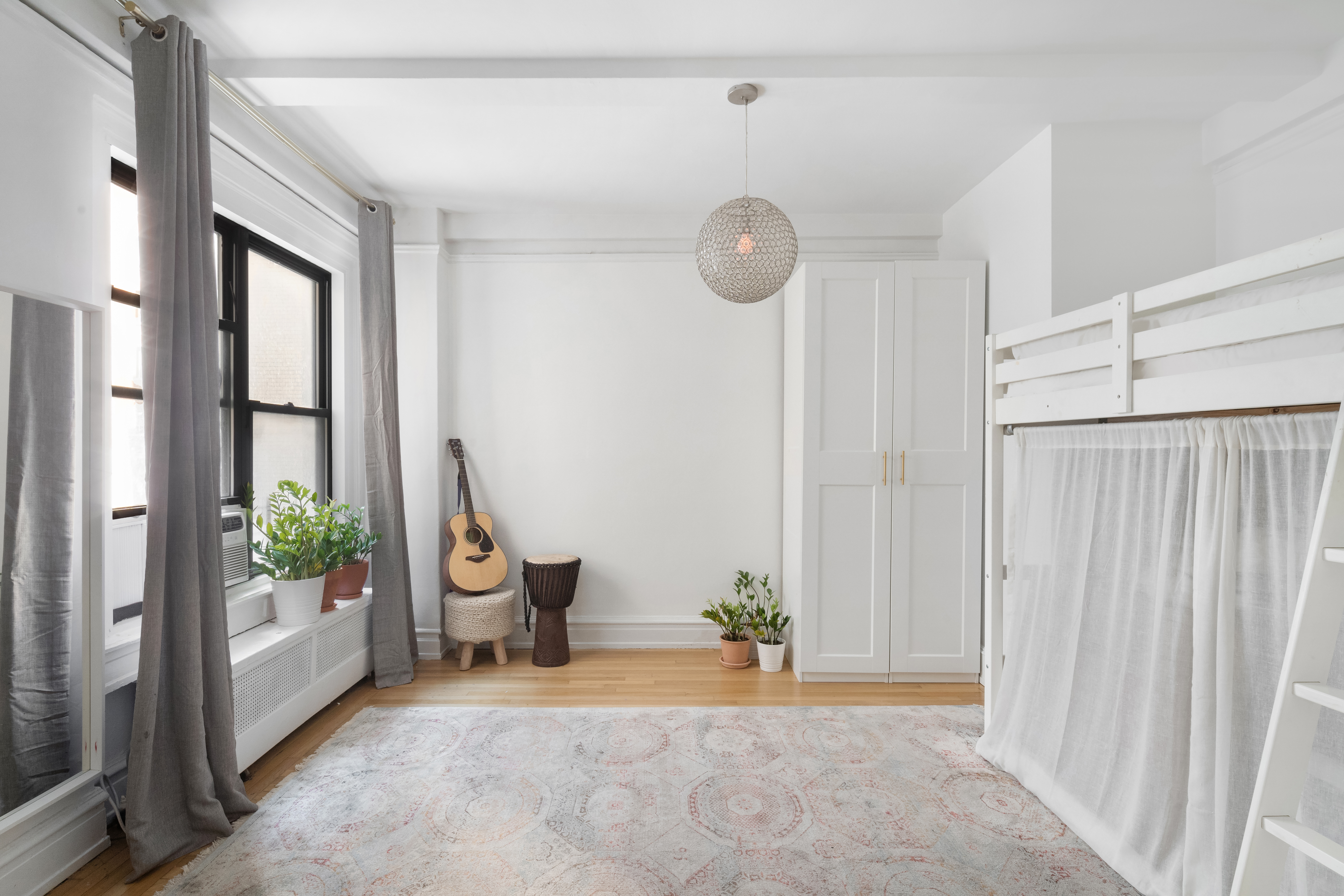 150 West 55th Street, Unit 5D Manhattan, NY 10019 - Photo 10 of 12 a view of an entryway with wooden floor