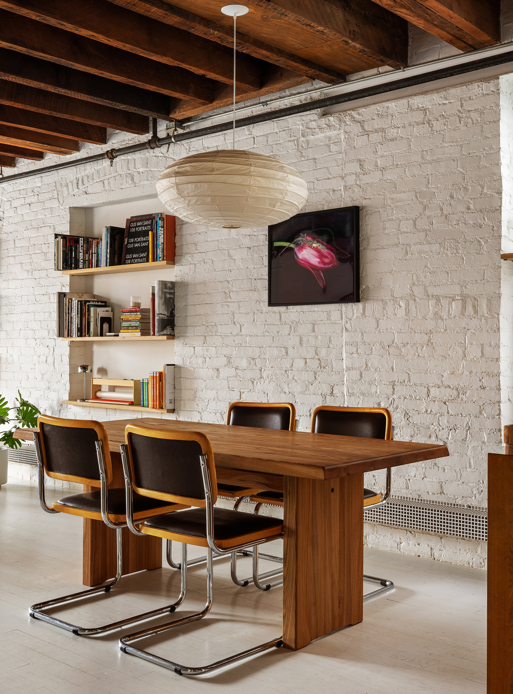 48 Canal Street, Unit 4 Manhattan, NY 10002 - Photo 3 of 13 a living room with fireplace furniture and a flat screen tv