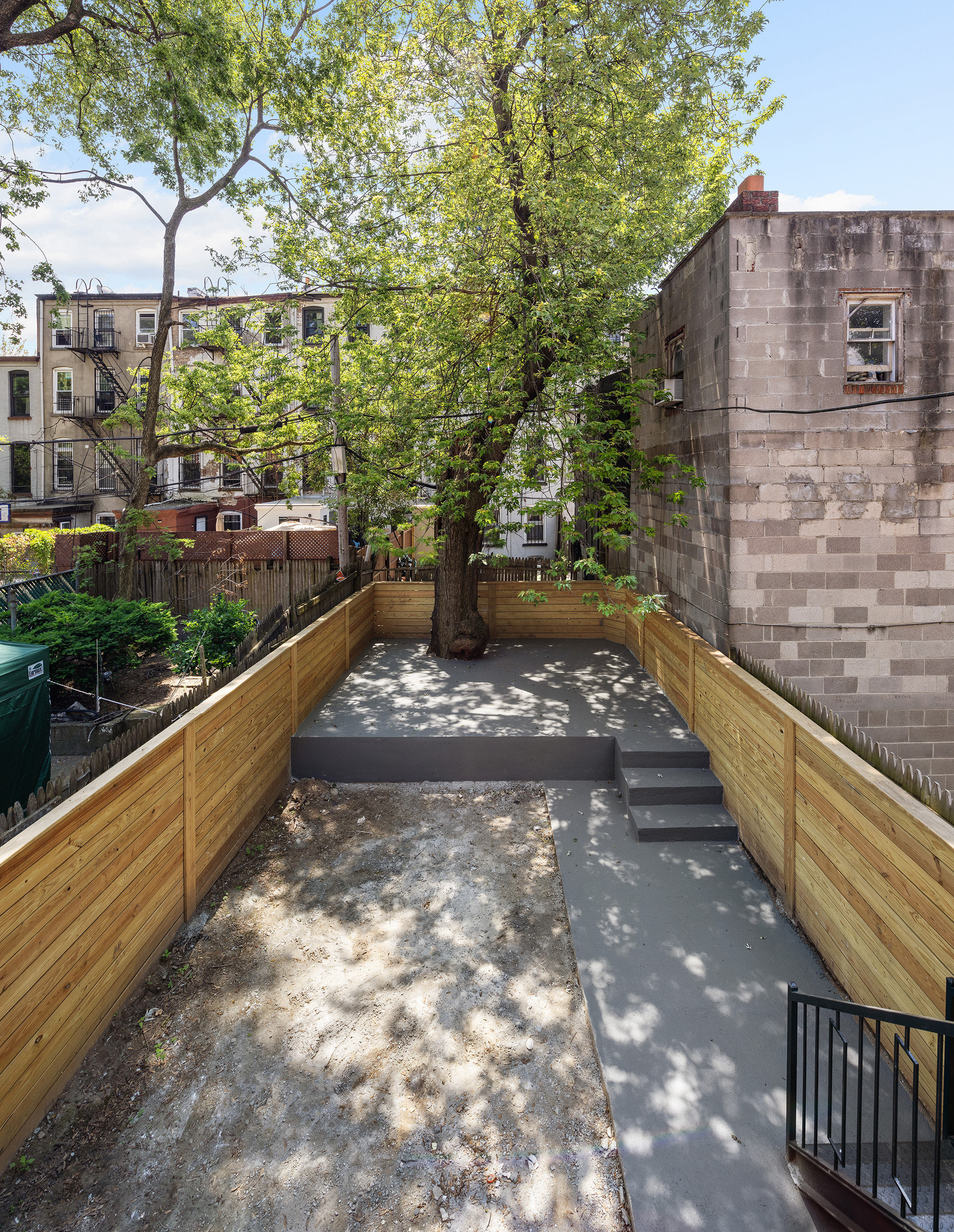 698 Macon Street Brooklyn, NY 11233 - Photo 14 of 17 a view of a pathway with a yard