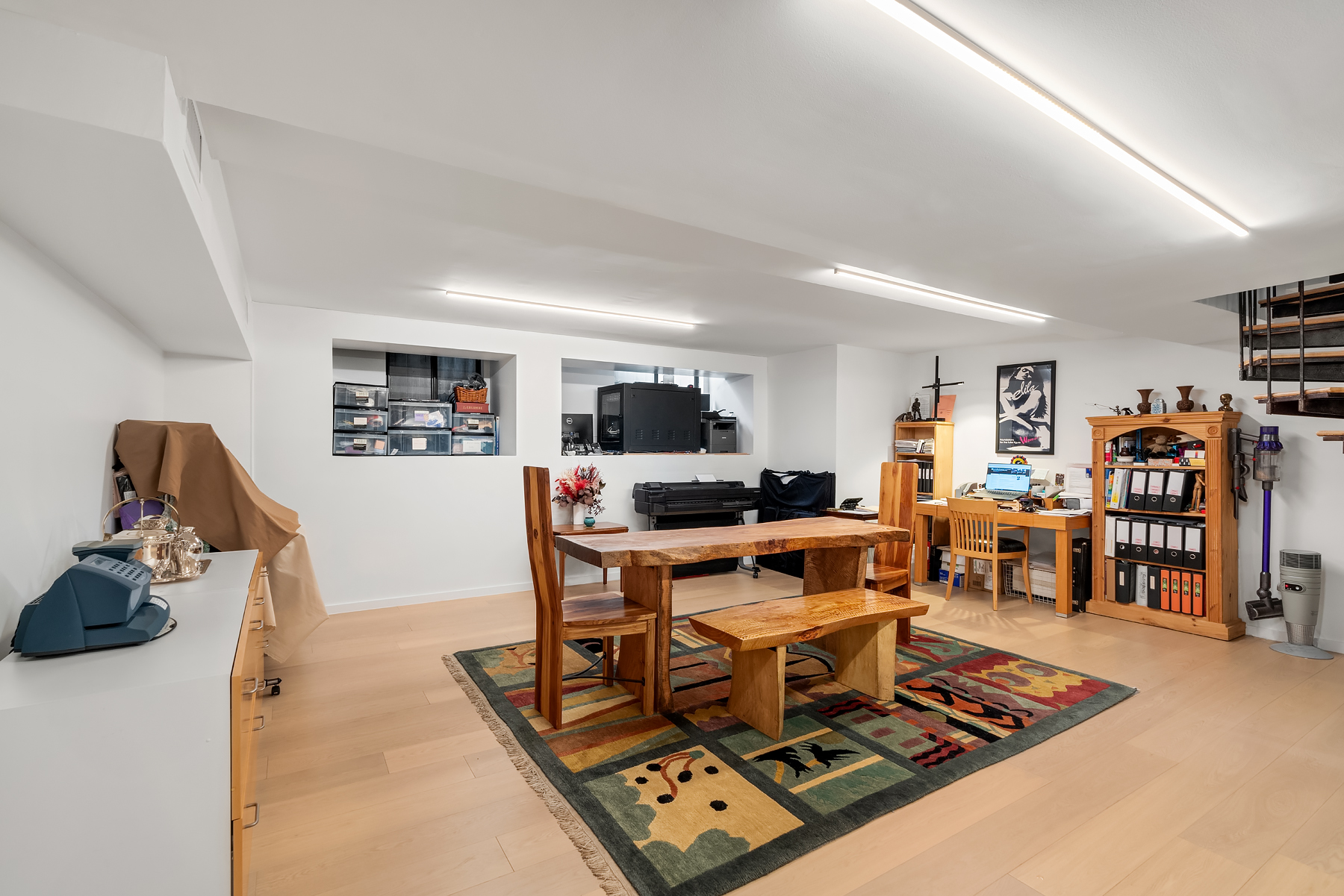 248 East 31st Street, Unit 1D Manhattan, NY 10016 - Photo 8 of 13 a living room with furniture and a flat screen tv