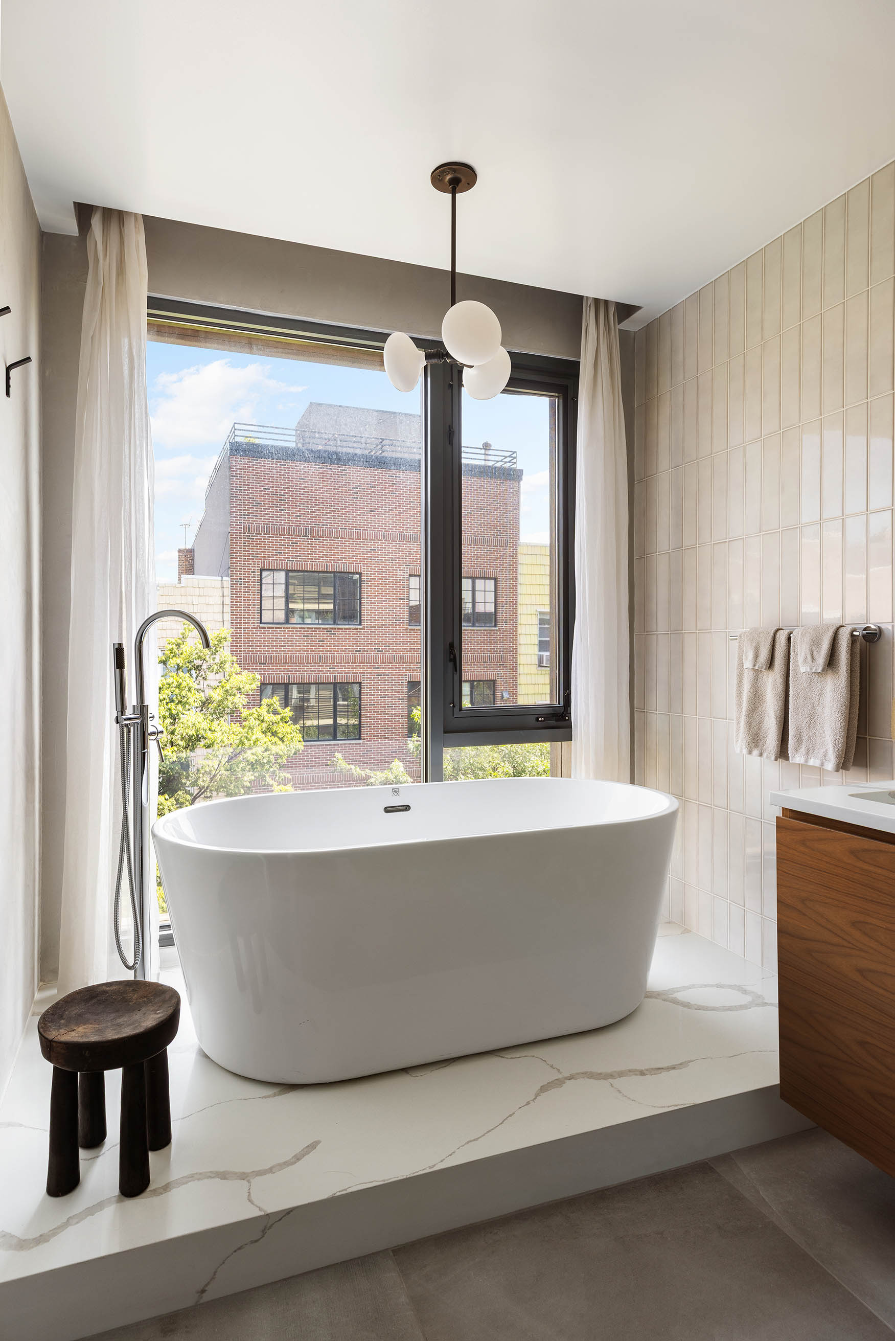 220 North 6th Street, Unit PH Brooklyn, NY 11211 - Photo 8 of 15 a living room with furniture and a large window