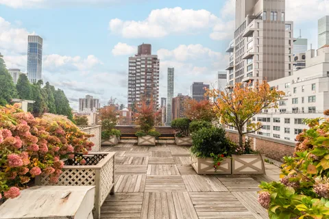 a view of a city with tall buildings