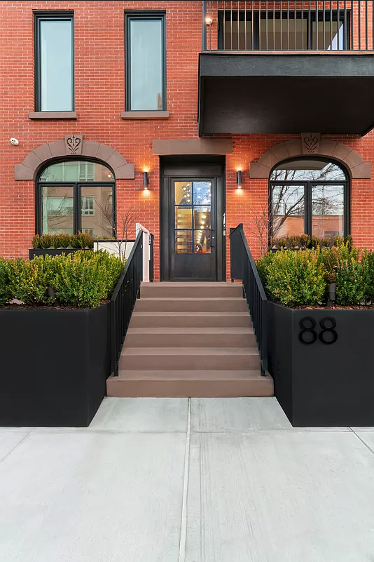 88 Lexington Avenue, Unit 1A Brooklyn, NY 11238 - Photo 11 of 13 a front view of a house
