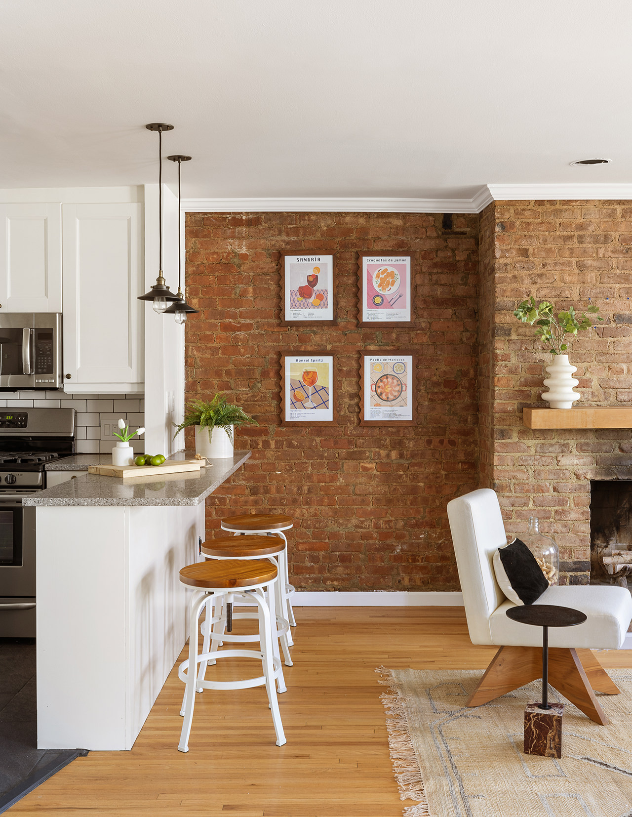 283 Hicks Street, Unit 4B Brooklyn, NY 11201 - Photo 2 of 15 a living room with stainless steel appliances furniture a rug and a large window