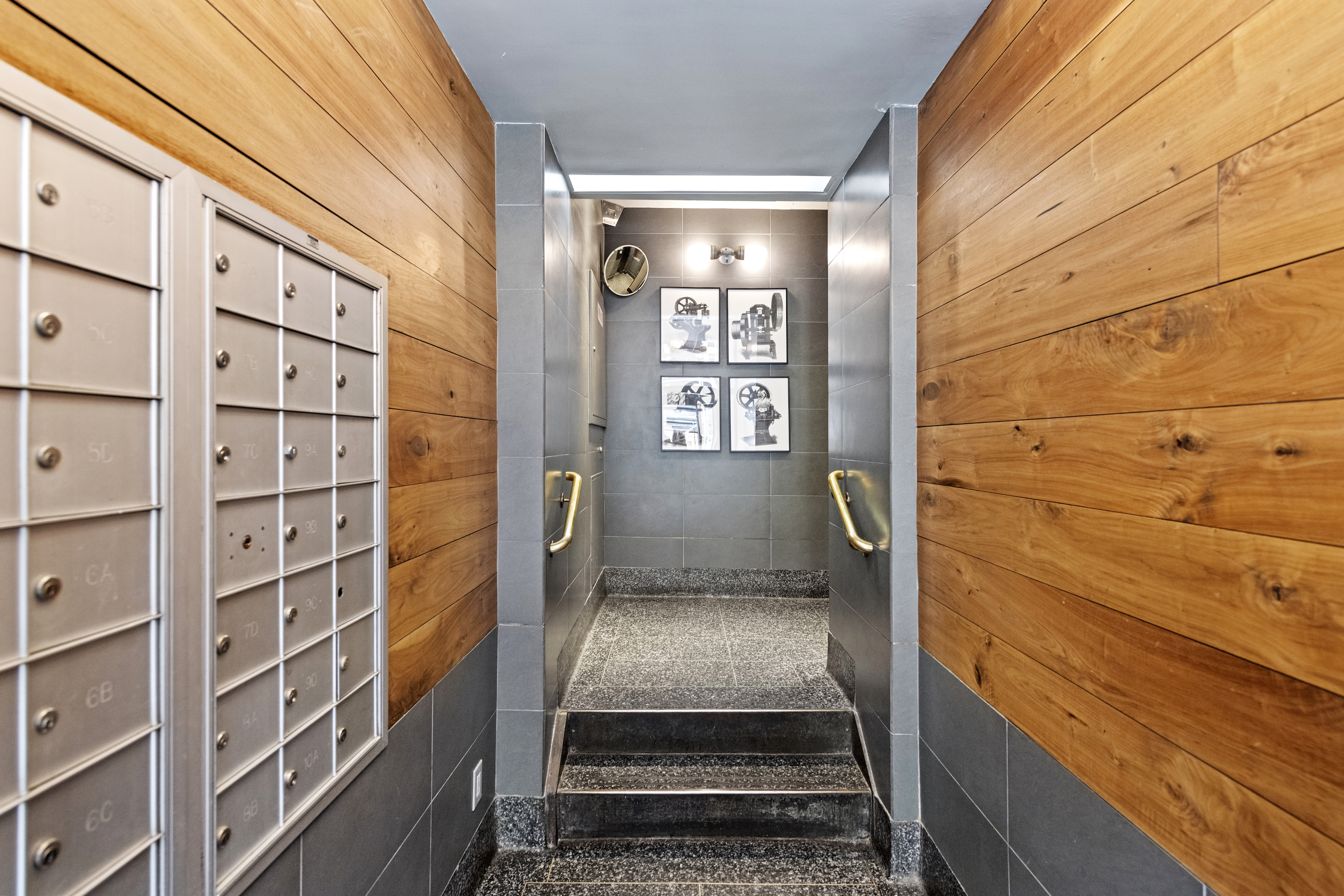 312 East 23rd Street, Unit 7B Manhattan, NY 10010 - Photo 12 of 14 a door view with brick walls