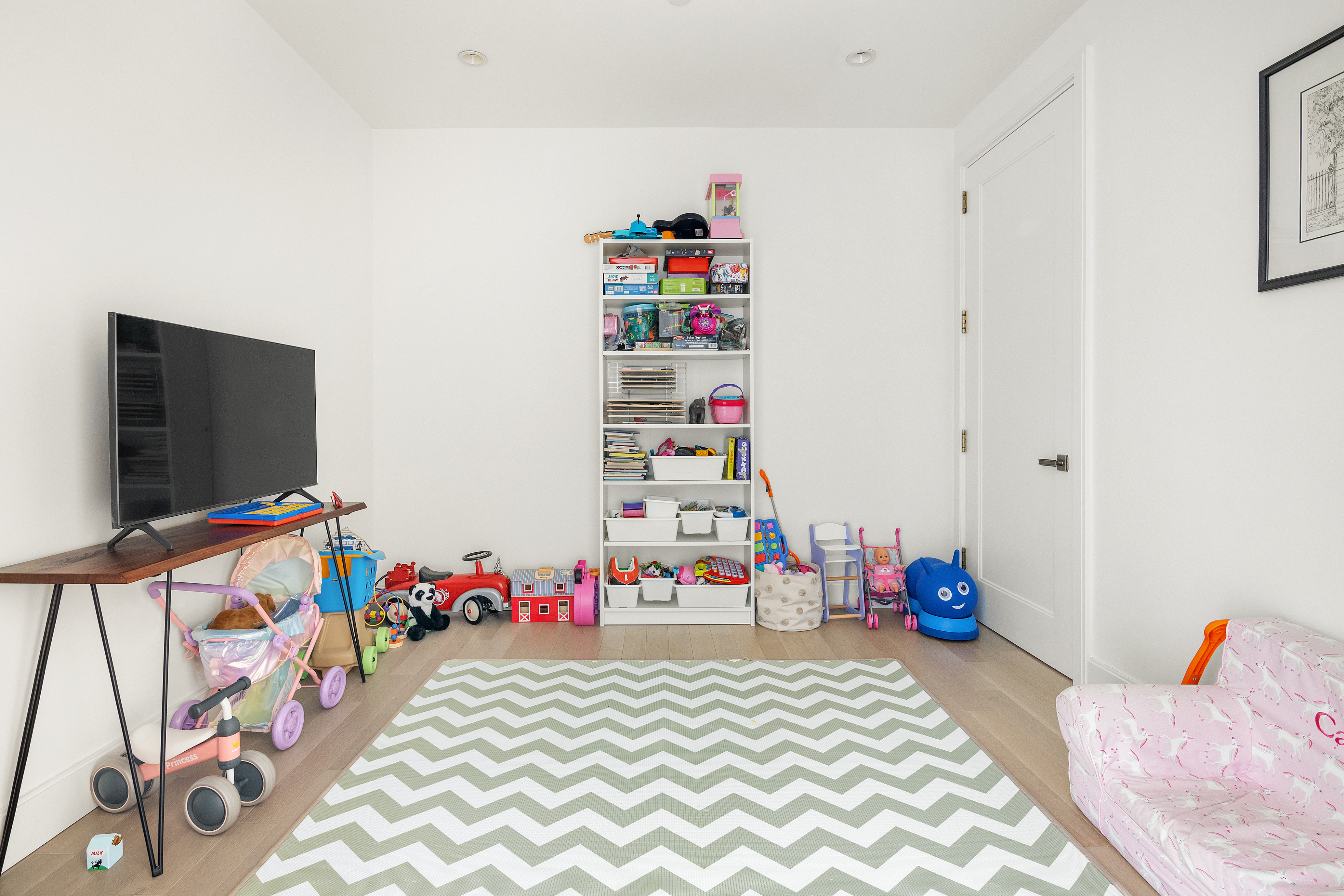 100 Barclay Street, Unit 16D Manhattan, NY 10007 - Photo 11 of 14 a bedroom with a bed and a flat screen tv