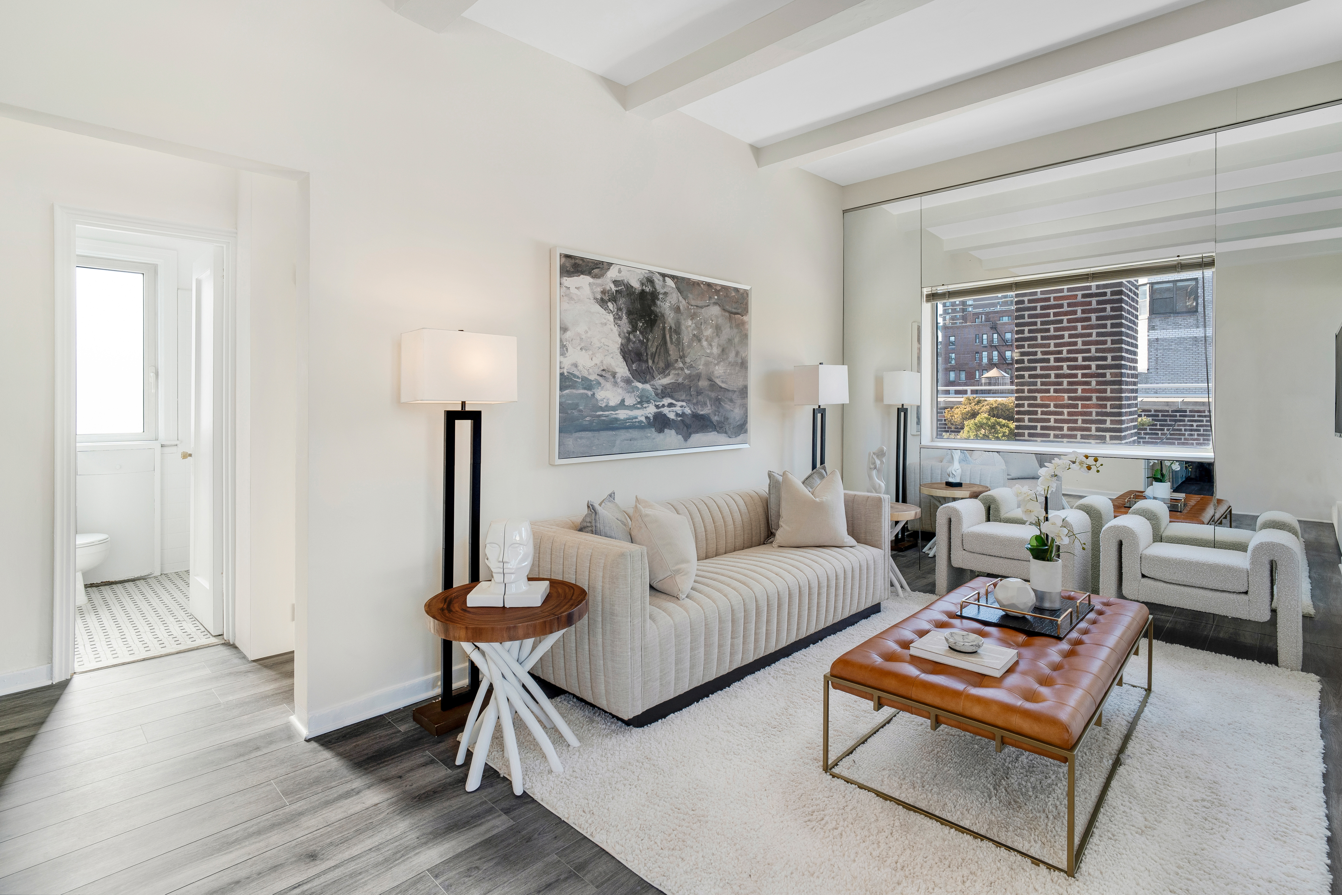 1349 Lexington Avenue, Unit PH2 Manhattan, NY 10128 - Photo 2 of 18 a living room with furniture and a table