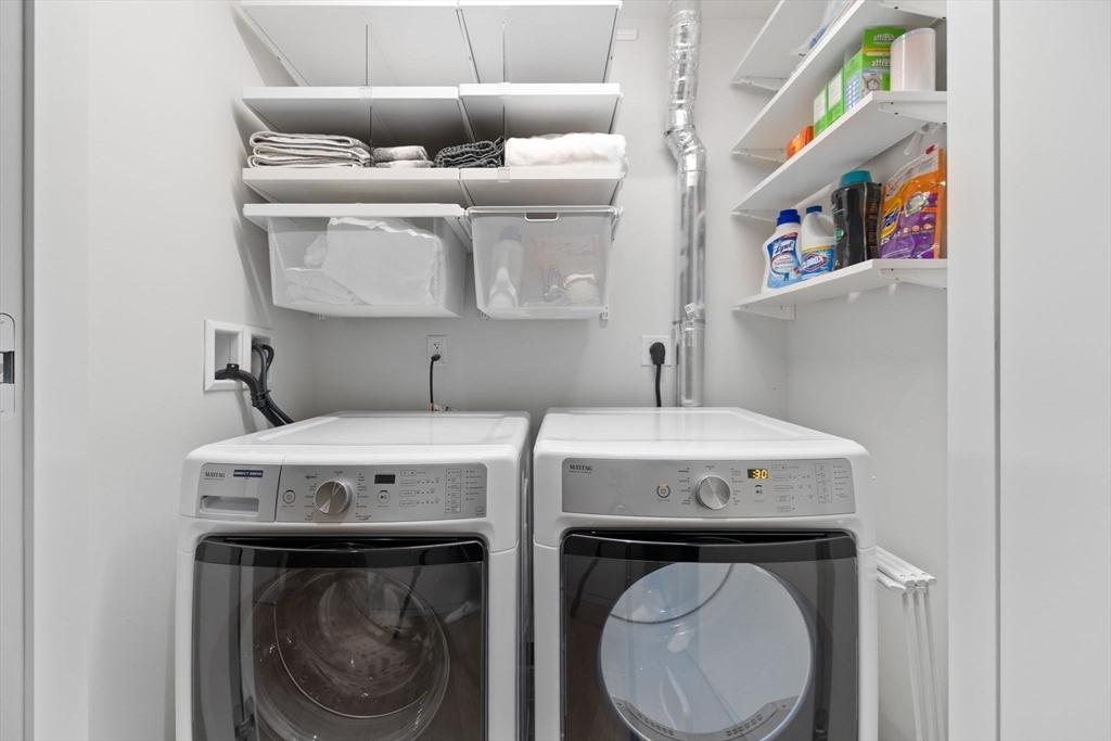 10 Farnsworth Street, Unit 3A Boston, MA 02210 - Photo 26 of 31 a utility room with dryer and washer