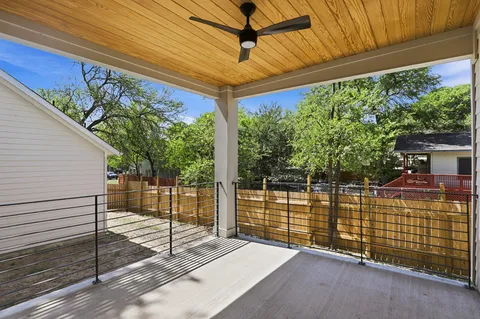 a view of a backyard with a porch