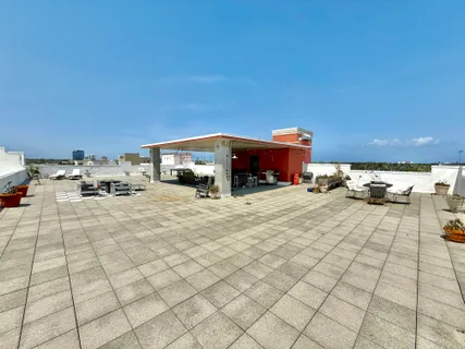 a view of a terrace with chairs