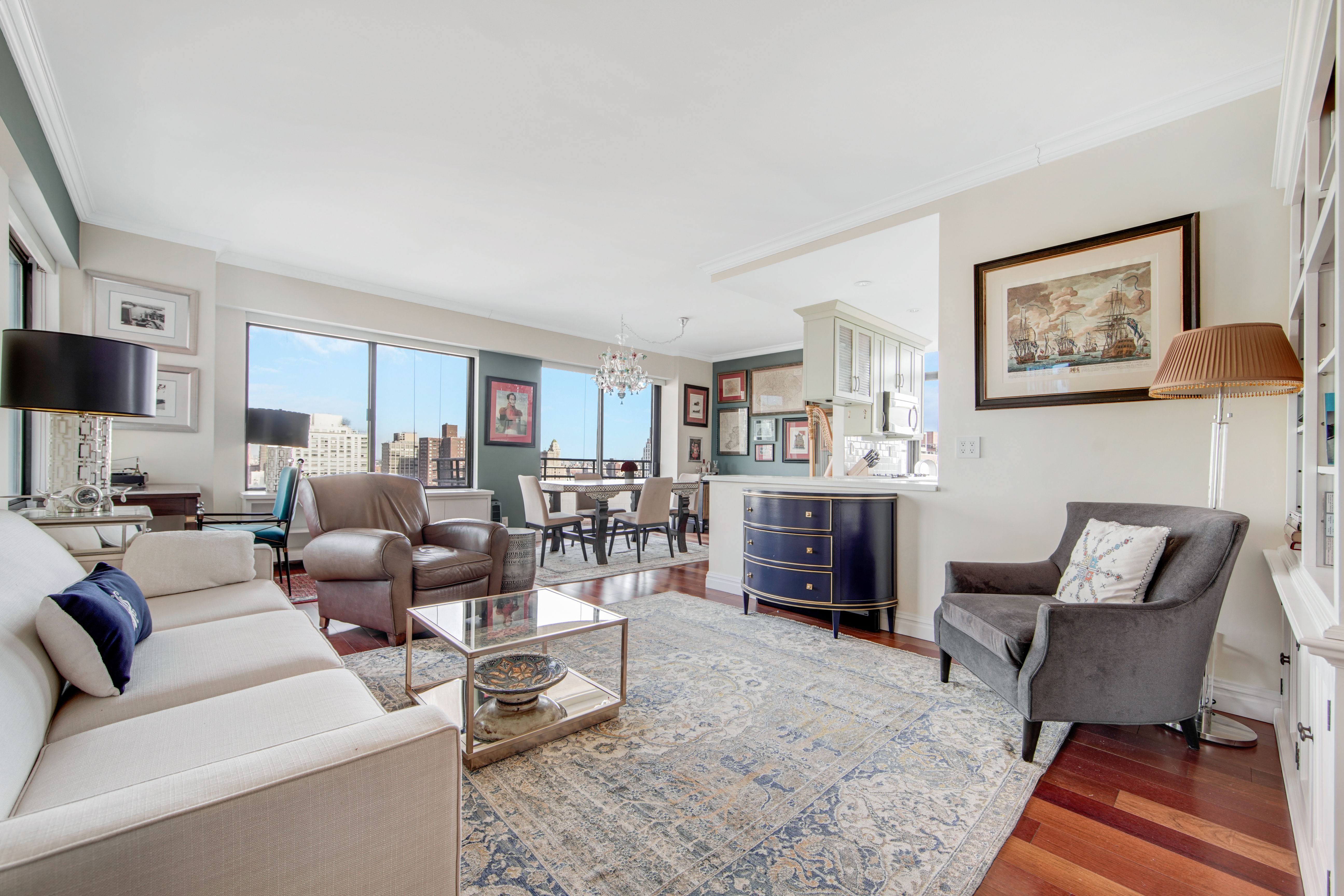 400 East 70th Street, Unit 3301 Manhattan, NY 10021 - Photo 2 of 20 a living room with furniture and a fireplace