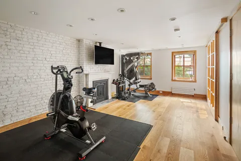 a view of a room with gym equipment