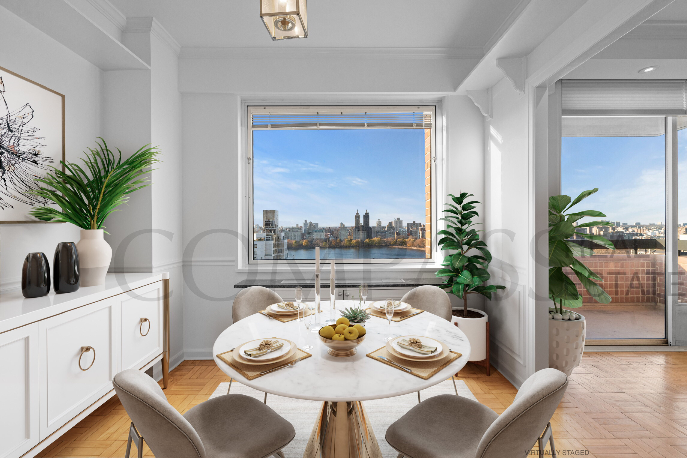 45 East 89th Street, Unit Undisclosed Manhattan, NY 10128 - Photo 2 of 10 a living room with furniture and a potted plant