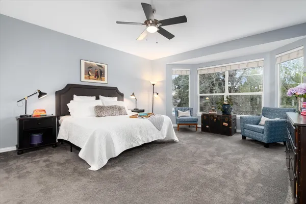 a bed room with a bed and a tv