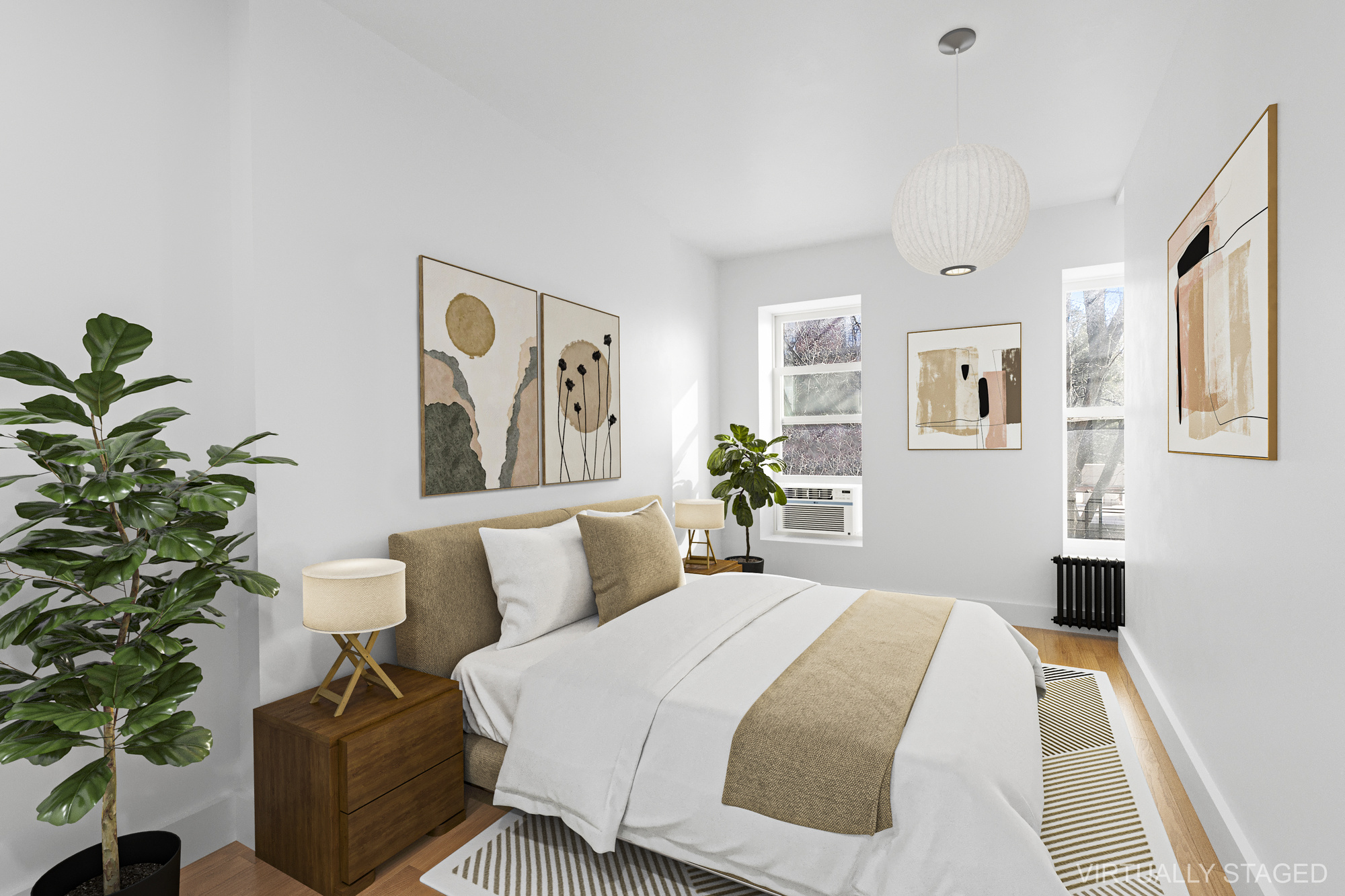 82 7th Avenue, Unit 4 Brooklyn, NY 11217 - Photo 6 of 10 a bedroom with a large bed and a potted plant