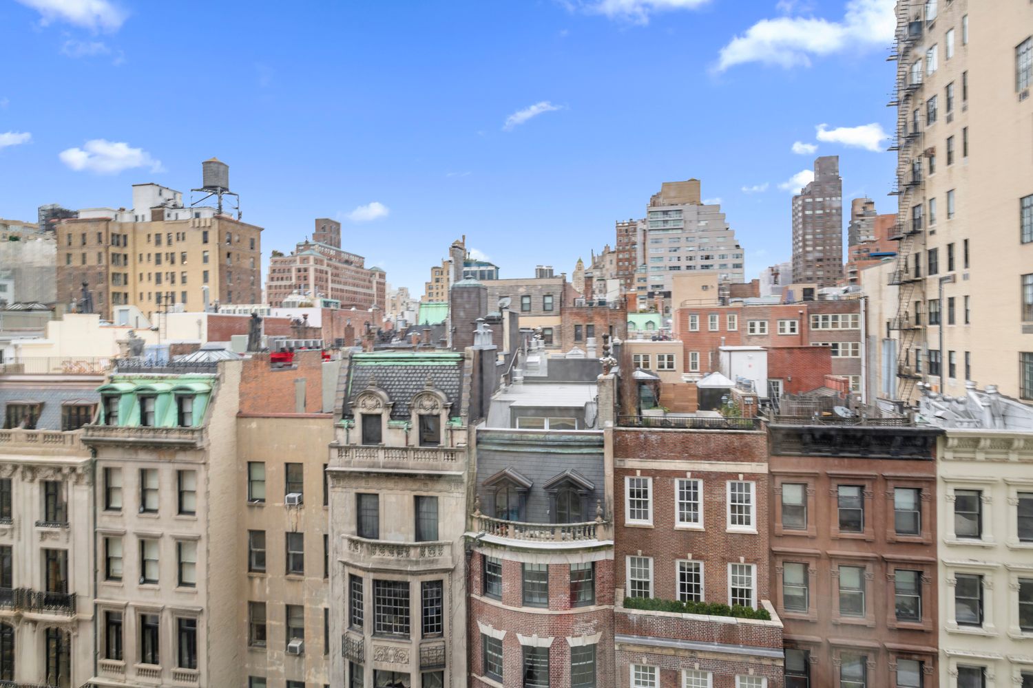 650 Park Avenue, Unit 9B Manhattan, NY 10065 - Photo 12 of 14 a view of a city that has tall building