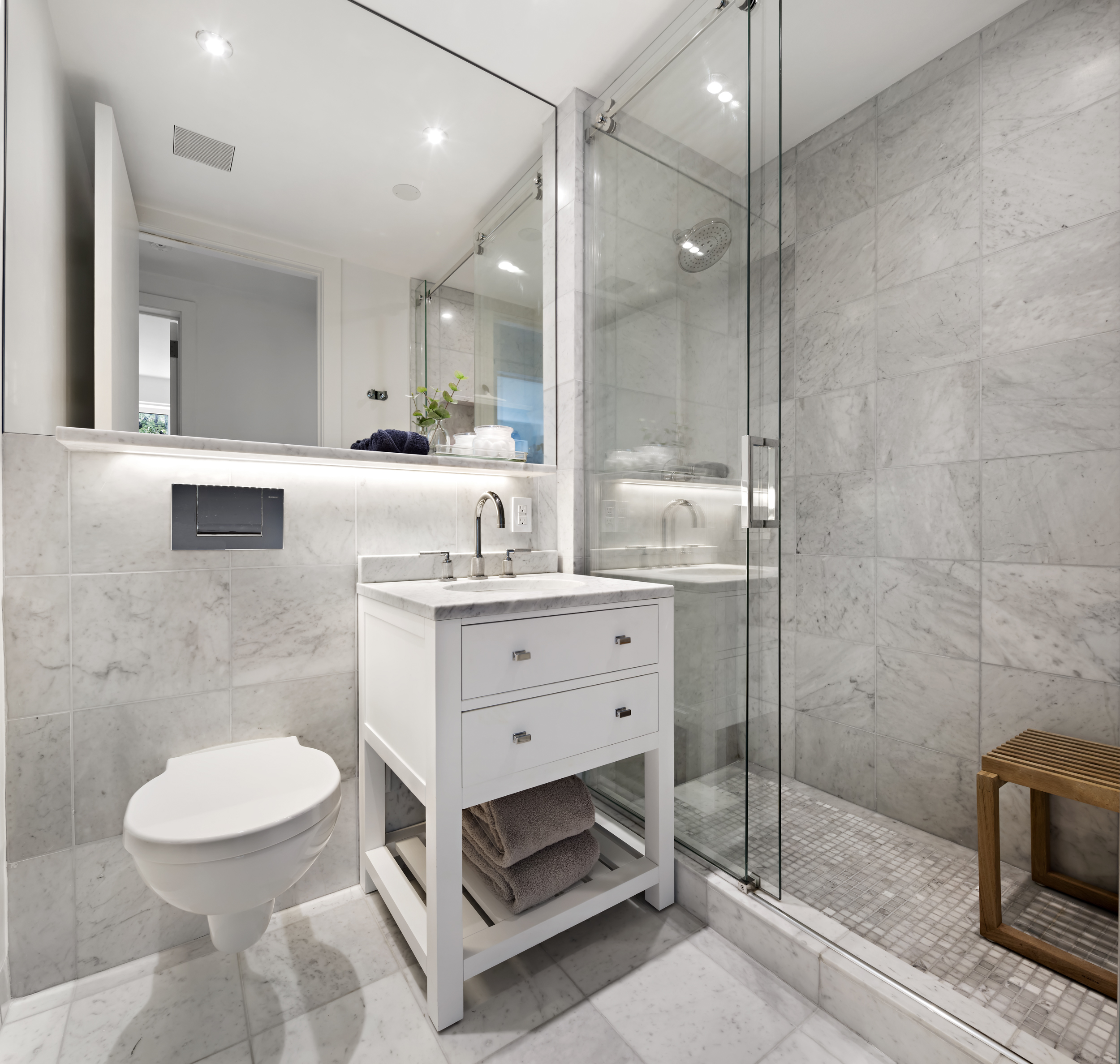 744 Greenwich Street, Unit 4 Manhattan, NY 10014 - Photo 29 of 34 a bathroom with a double vanity sink toilet and shower