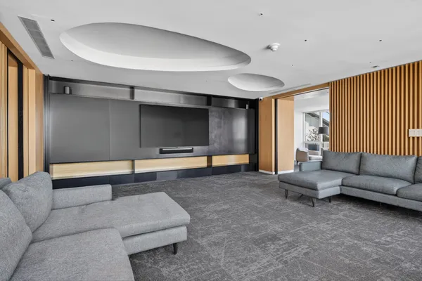 a living room with furniture and toys