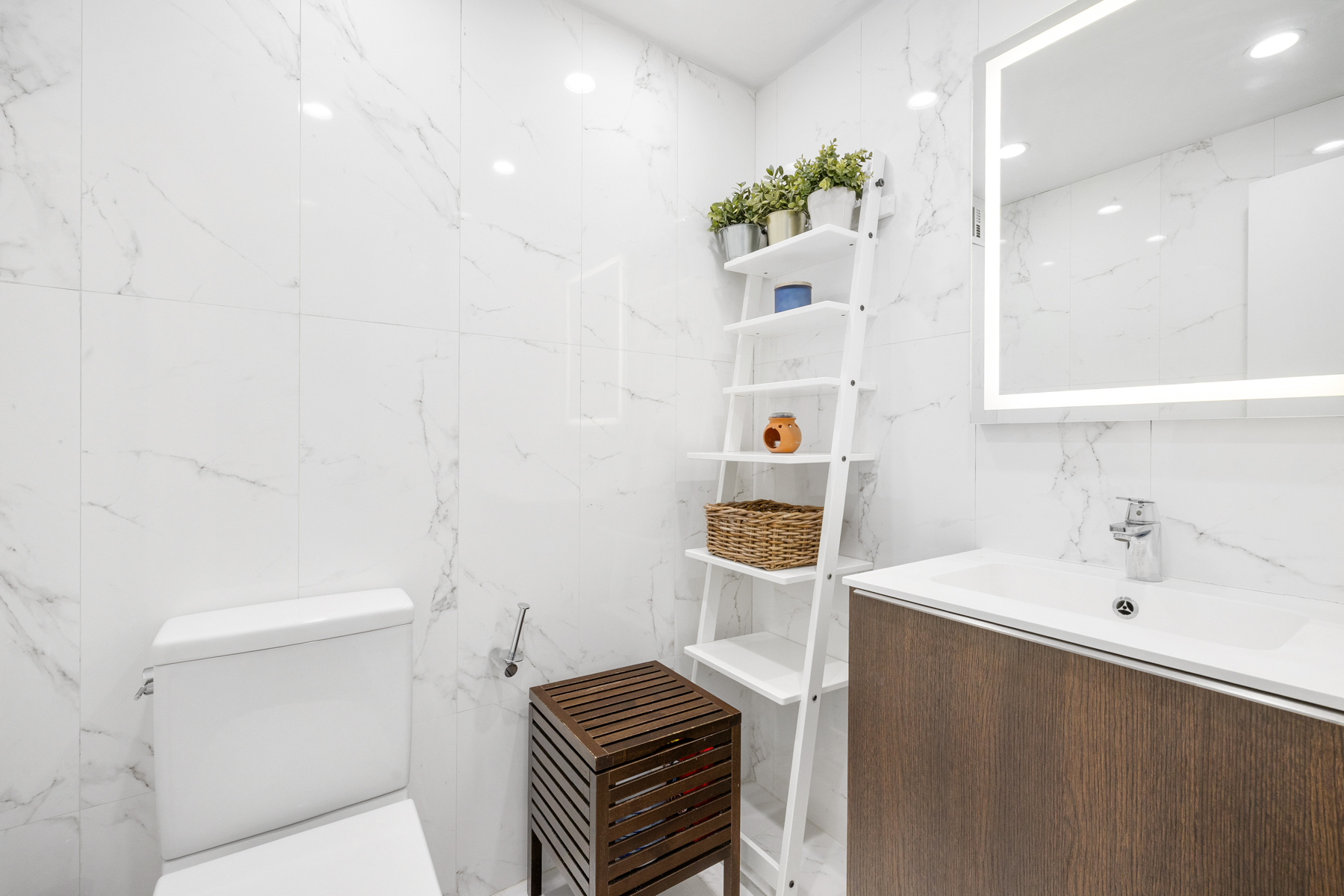 50 Lexington Avenue, Unit 25E Manhattan, NY 10010 - Photo 12 of 13 a bathroom with a sink toilet and shower