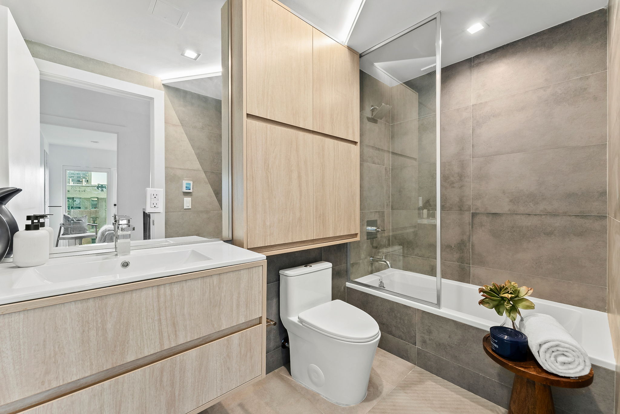 553 West 182nd Street, Unit 5R Manhattan, NY 10033 - Photo 11 of 12 a bathroom with a sink toilet and shower