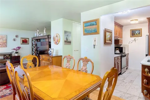 a view of a dining room with furniture